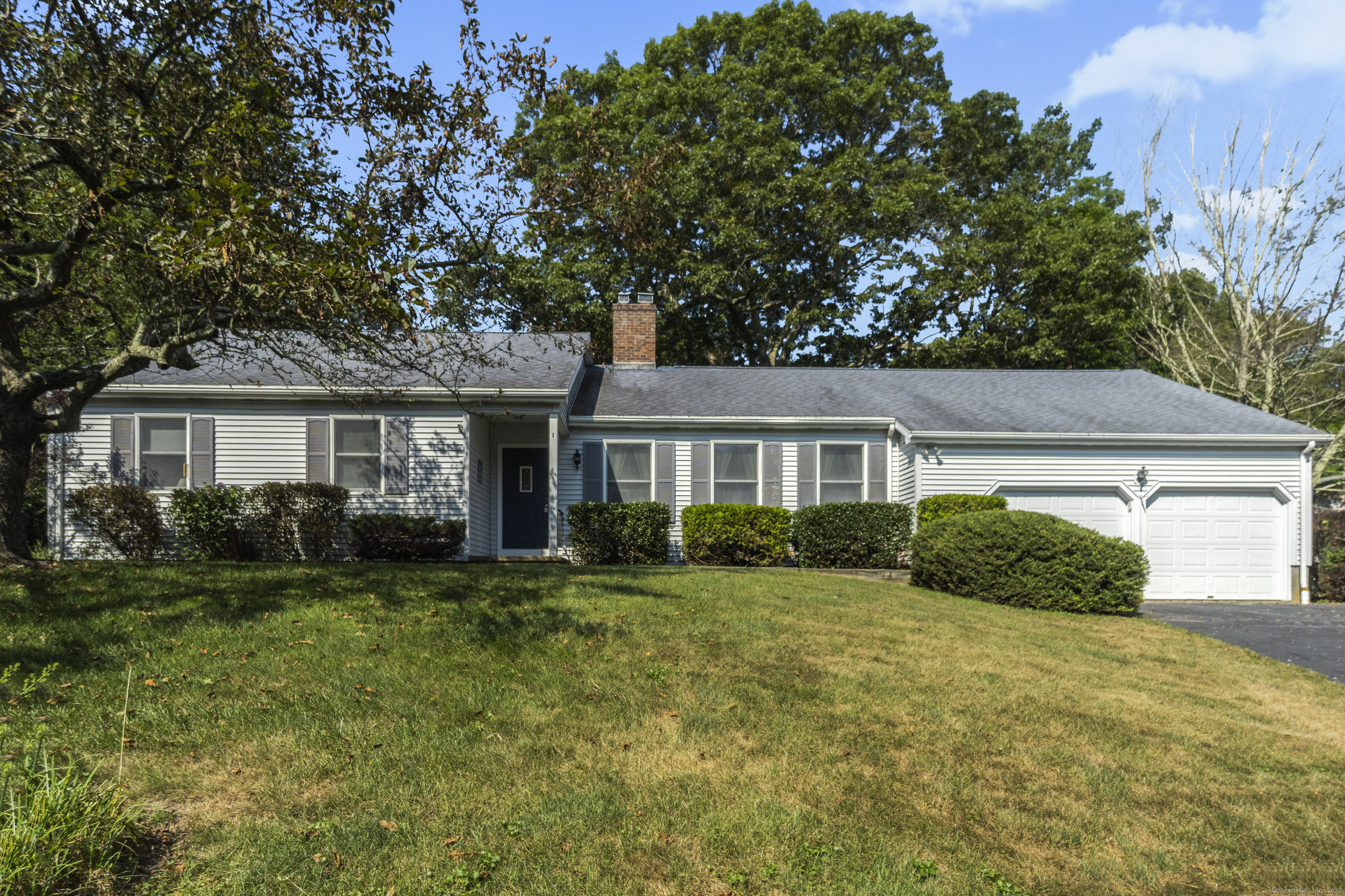 Custom ranch in prime Niantic location! Davis Beach rights/ access noted in deed, membership optional. Annual dues are approximately $250.00, one time fee of $1500.00 to join. Seller is not an active member. Open floor plan with masonry wood burning two sided fireplace. Inviting kitchen with expansive quartz center island. Skylight adds to the brightness of the room, remodeled around 2007. Complete one floor living with laundry/mudroom right off the kitchen! Central air, ceilings approximately 8 1/2', generous 2 car garage with one deeper bay- great for lawn/beach equipment. Walk up storage over garage is a real bonus. Basement is full, unfinished, and offers room for completion if desired. Wonderful location for walking, biking, as well as kayaking. Minutes to downtown Niantic where you can enjoy a variety of restaurants, shopping, and boardwalk access. Literally one step and you are in the door to your new home!