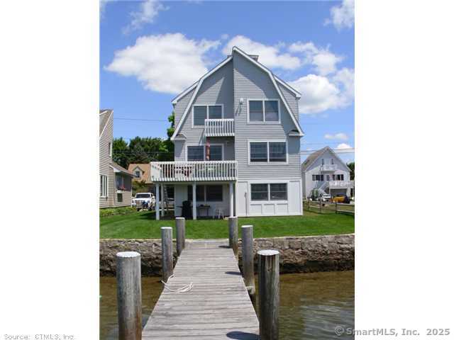 Terrific vacation spot right on the harbor with a dock! Fully furnished, the home is a short walk to everything that Groton Long Point is famous for: the beaches, harbor, point spa, ball field and tennis courts. Stunning sunsets from the deck. Available for the month of August, 2026.