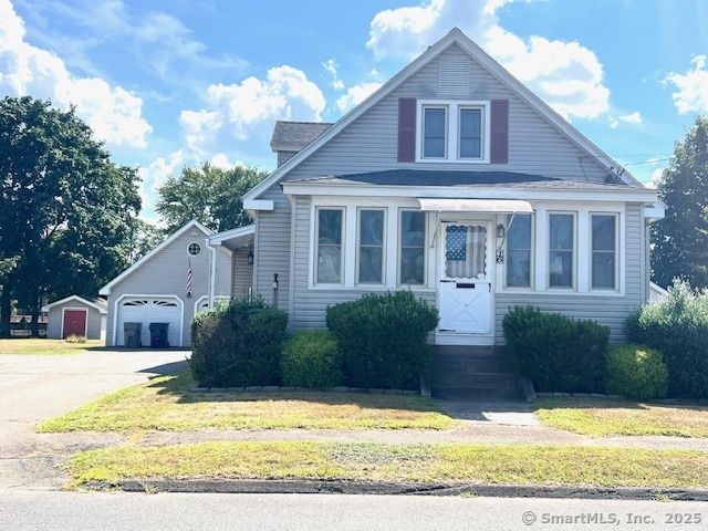 Welcome home to this beautifully maintained Cape-style bungalow loaded with warmth, character, and classic charm. Featuring 2-3 bedrooms, this inviting home is perfect for those looking for cozy, one floor living.  Features you will adore about this home include an enclosed front porch, a sunny living room with original built-ins, a charming eat-in kitchen with tons of cabinets and pantry space, a formal dining room with vintage touches and gorgeous woodwork, trim, and moldings throughout that capture the home's character! Two spacious bedrooms plus a third room perfect for a guest room, office, or den.   The storage in this home is amazing with a full basement and a walk-up attic where there's loads of potential to finish if you desire and plenty of room for storage. The basement includes a laundry area and a wine cellar too!  Private backyard with covered patio overlooks the beautiful backyard. A nice spot to kick back and relax. The exterior also features a detached 2 car garage and a shed.  The original owners have maintained this home beautifully. Updates include newer oil tank, condensing unit and boiler.  Nearby Norton Park, shopping, restaurants, schools and more; this is one home you do not want to miss!  **PROFESSIONAL PHOTOS COMING SOON**