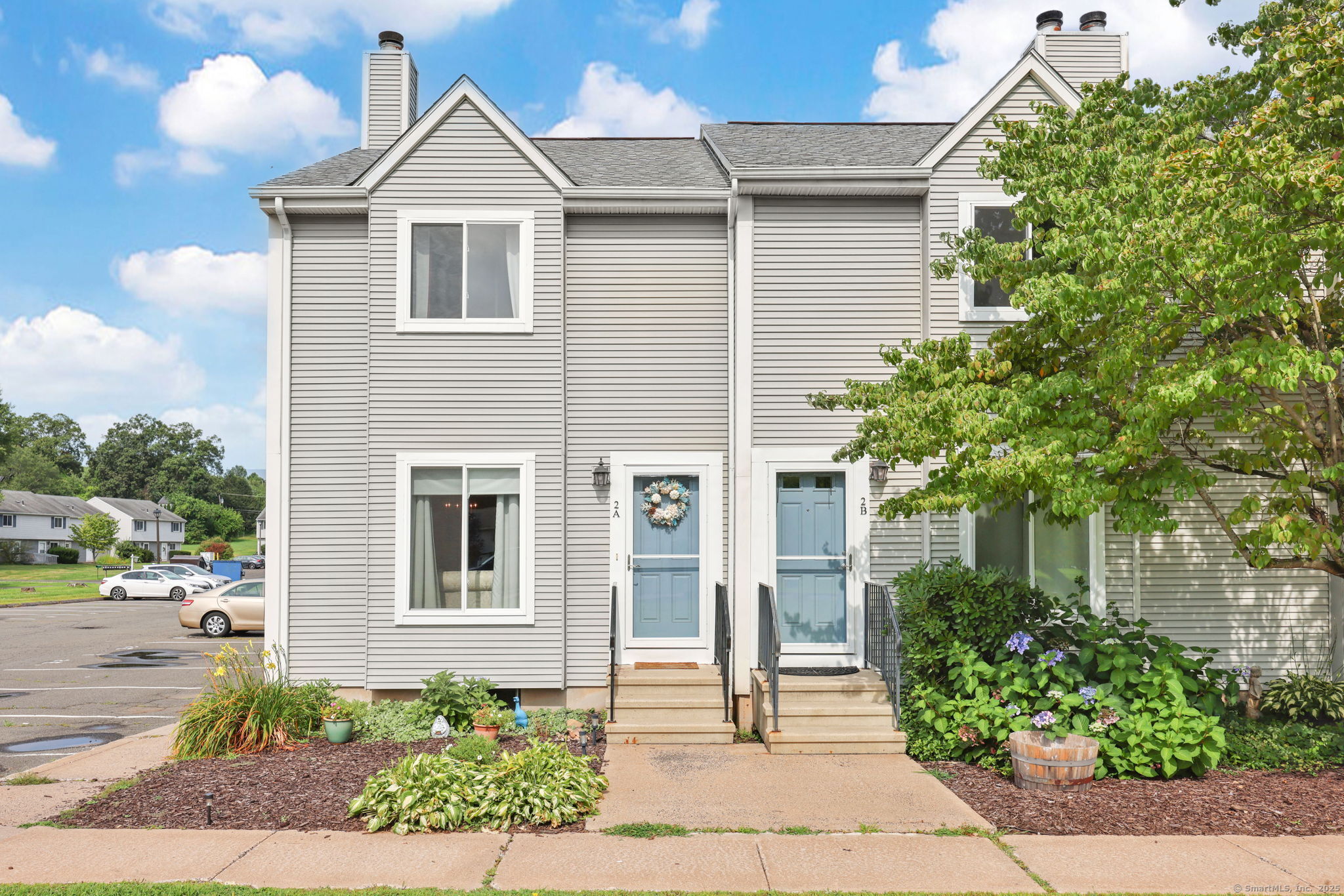 OFFER DEADLINE - TUESDAY, AUGUST 19, 5 pm: **The Courtyard at Granby Village!** Beautifully maintained 2BR, 2.5BA corner unit townhouse offering comfort, style & convenience. Sunny living room with cozy fireplace, modern kitchen with plenty of counter space & storage, plus a deck perfect for morning coffee. Upstairs, enjoy two spacious primary suites each with a full bath, plus a convenient second-floor laundry area with full-size washer & dryer. The partially finished basement features a family room - ideal for movie nights or relaxing evenings. Central air & forced-air heat ensure year-round comfort. Two assigned parking spaces included. Pets allowed with some restrictions. Low-maintenance living so you can spend more time enjoying life! Fantastic location with easy access to highways, Bradley International Airport, and the amenities of Simsbury, Avon, Granby & Hartford. Whether you're downsizing, buying your first home, or looking for a stylish move, this East Granby gem is ready for you!