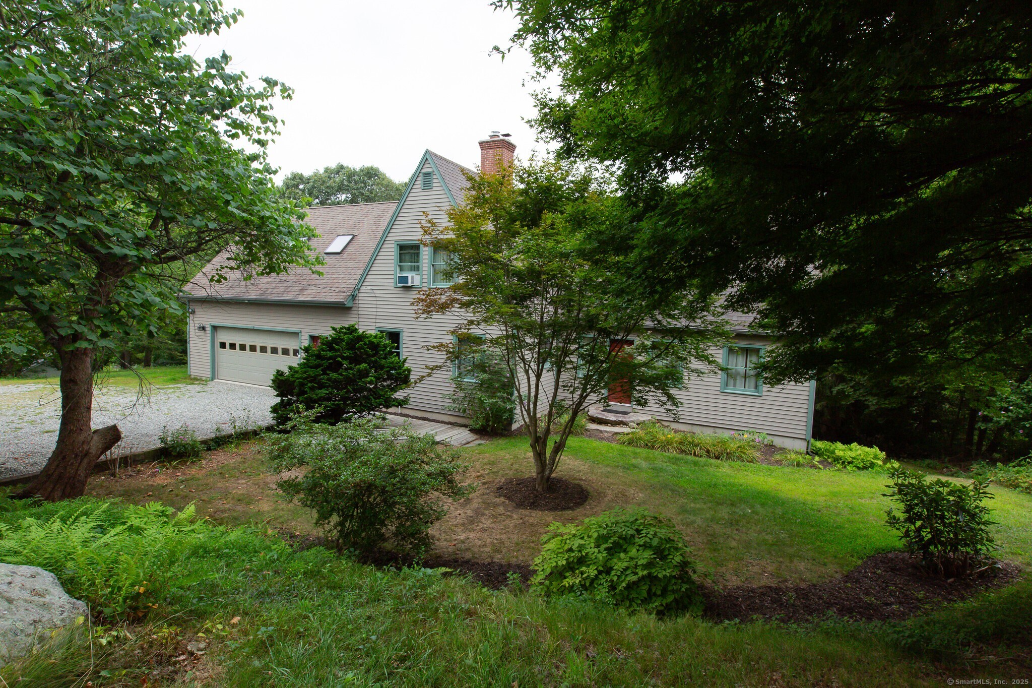 Are you looking for extra space for a theatre room? in law apartment? office? the second level has a spacious 450 sq ft room with sliders that go out to a 125 sq ft deck. overlooking the pond.  A 550 sq ft 2 car garage has a lot to offer. Also offers a private stairway to the upstairs great room. A 3 bedroom home featuring a first floor primary bedroom with a full bath and 2 bedrooms upstairs with a full bath. The spacious living room offers a fireplace with a wood stove for those chilly nights. The dining room also offers a wood burning stove. Plenty of privacy and space outside. Your chance to own a very special island! The basement has a 400 sq ft workshop, workbench included! Step outside and enjoy the privacy and tranquility this property offers. With plenty of outdoor space, it's perfect for relaxing, entertaining, or exploring. And don't forget the 400 sq ft basement workshop, complete with a workbench-perfect for hobbies, projects, or extra storage. This is more than just a home, it's a lifestyle. Don't miss your chance to own this truly special island retreat. Schedule your private showing today!