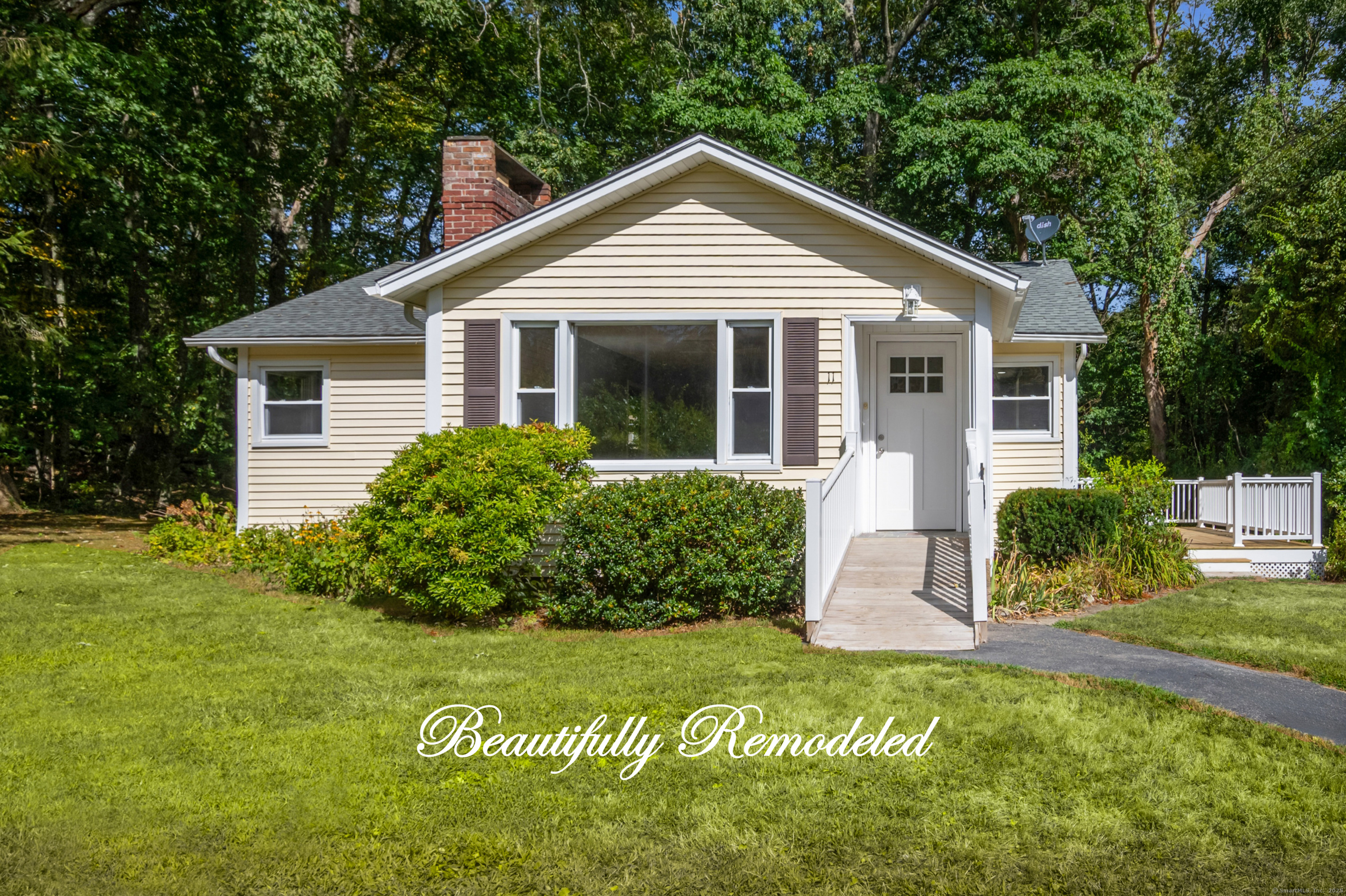 EXPERIENCE MODERN ONE-LEVEL LIVING IN THIS GORGEOUS REMODELED GALES FERRY HOME! Imagine starting your day in an expansive living room where sunlight dances across refinished hardwood floors & a charming whitewashed fireplace adds a cozy touch. This is the heart of your new home-tucked at the end of a peaceful cul-de-sac, offering over 1,500 SF of thoughtfully updated space where comfort, style & privacy come together. The living room opens effortlessly to the dining area, a breakfast bar perfect for morning coffee & a stunning brand-new kitchen with stainless-steel appliances, granite counters & crisp white cabinets. Down the hall, 3 bedrooms are ready for rest & relaxation, each with ceiling fans & 2 generously sized to fit a king-size bedroom set. Every detail has been refreshed, from the new doors, fresh paint, updated lighting & newer boiler & oil tank, to the new luxury vinyl flooring in the kitchen & the beautifully remodeled bathroom. The finished lower-lvl family room invites you to create the perfect home office, host game days, or unwind for movie nights. Outside, a brand-new oversized deck leads to the backyard retreat-perfect for barbecues or quiet evenings under the stars. And a ramp to the front door ensures easy access without sacrificing style. Conveniently located just 6 miles to the Subase & Mohegan Sun, 9 miles to Electric Boat & Pfizer & with Avalonia trails at the end of the road, this home blends beauty, luxury & accessibility in an irresistible package.