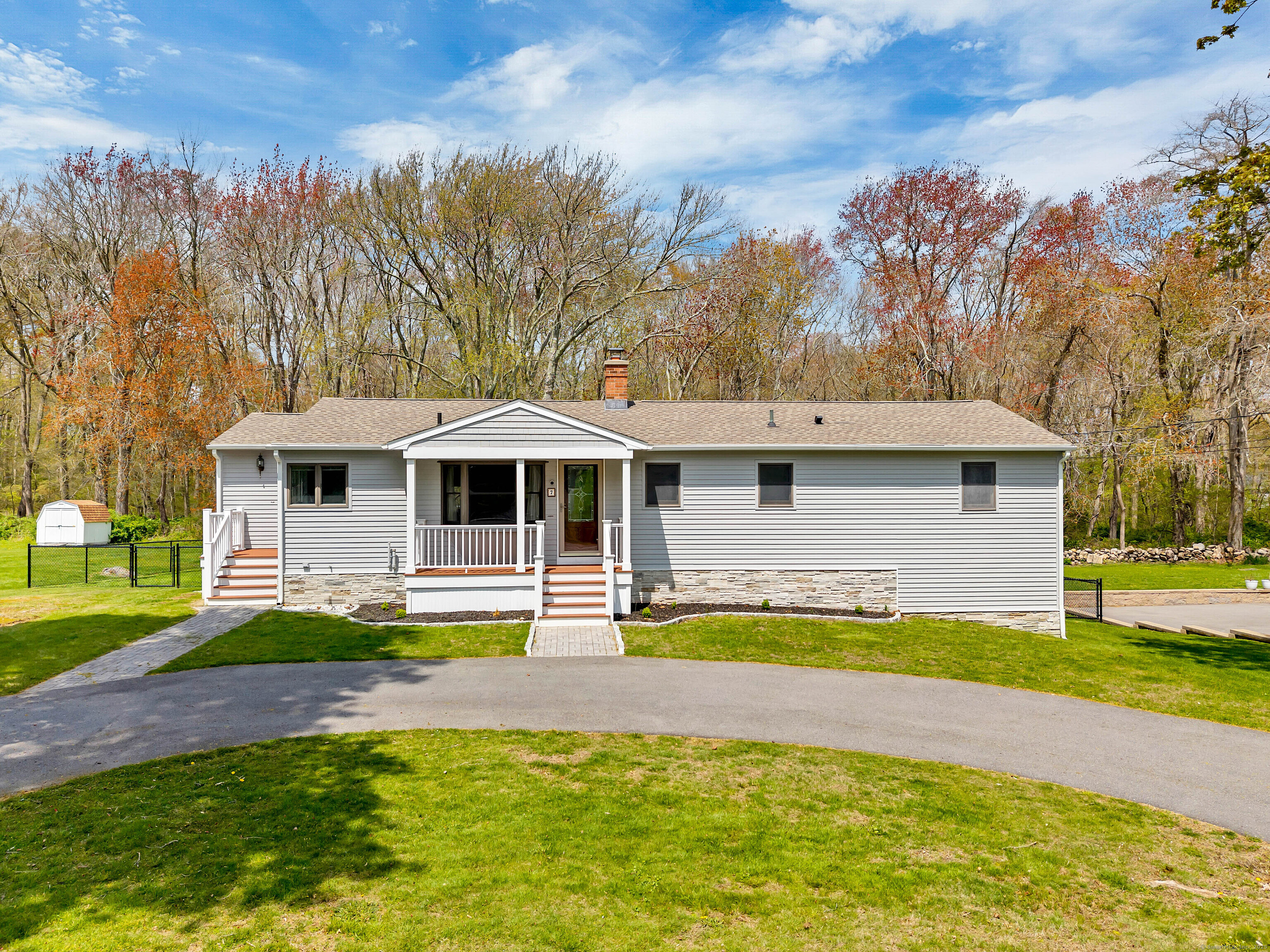 Life is better by the beach. This well-maintained and updated 3 bedroom, 2 bath Ranch is in the heart of Niantic. Come enjoy all this beautiful beach community has to offer! Huge open and versatile floor plan. The kitchen is loaded with cabinets, a center island with plenty of seating, granite counters, and a pantry. Newly renovated living room with vaulted wood ceilings, a skylight, and sliders to a 2-tier deck overlooking a level rear yard that has a brand new fence. Beneath the deck, you will find ample storage and an outdoor shower. Nice mudroom and pantry off of the kitchen. Primary bedroom with slider to the deck. Family room with lower level walk-out. Freshly painted less than 1 year ago. Roof is only 3 years old. Hardwood floors throughout. Pull down stairs for attic storage. Newer circular driveway - move-in ready! Updates in the last year: - New refrigerator  - New dishwasher - New carpet in the basement - Renovated living room - New black chain link fence installed around the entire backyard.