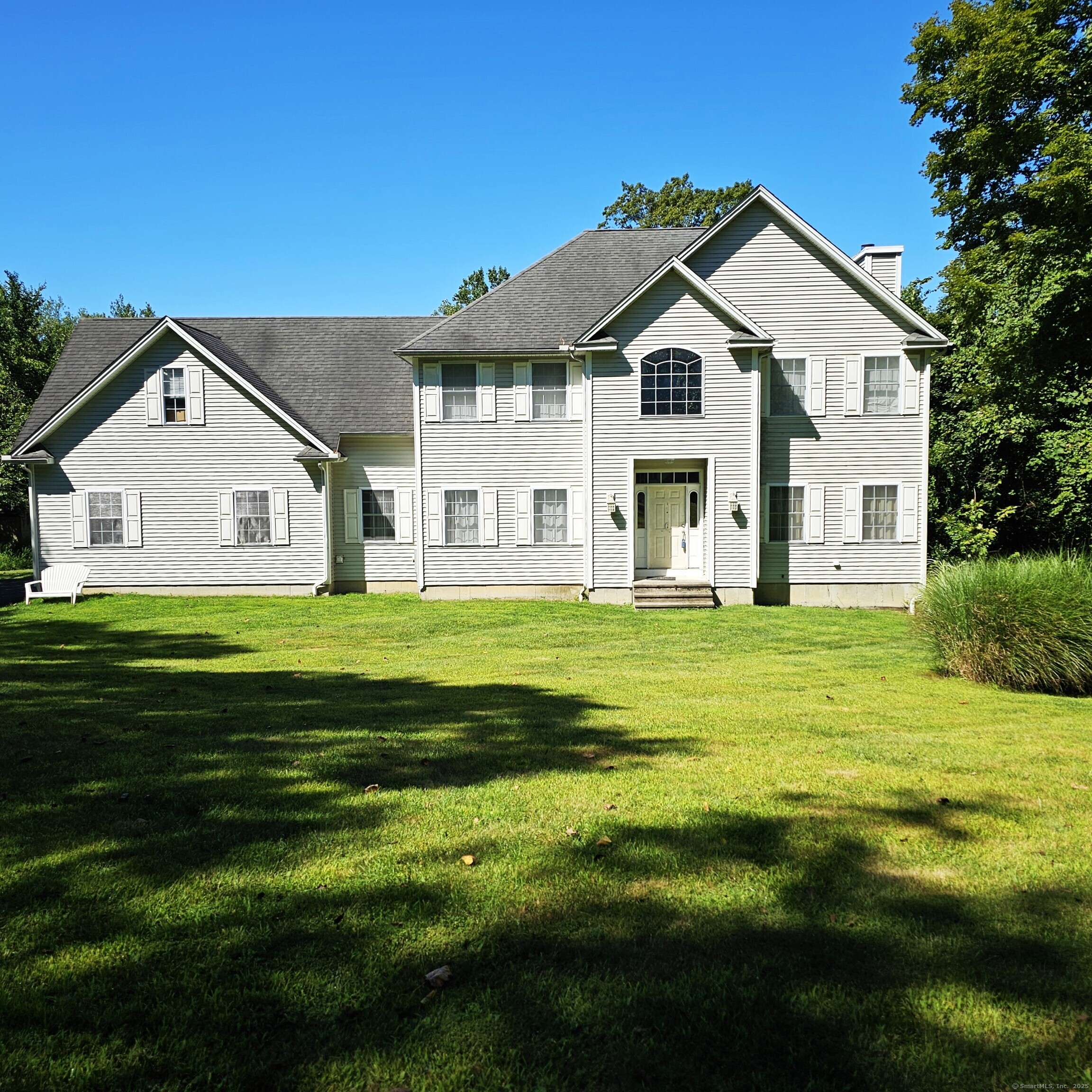 This well-designed home offers a fantastic opportunity for customization and personalization. Featuring beautifully refinished hardwood floors and upgraded molding throughout, it showcases three sizable bedrooms, each equipped with walk-in closets to maximize storage. The primary bedroom stands out with its inviting jacuzzi tub, a walk-in shower, and a spacious walk-in closet, creating a comfortable retreat for relaxation. Additionally, the partially finished basement with a new Pella Slider presents an excellent chance to expand your living space according to your needs. As an added bonus, both new Pella sliders have a transferable warranty. The large kitchen is thoughtfully designed, featuring a center island, and opens seamlessly to the dining and living areas, making it perfect for entertaining friends and family. New Pella sliders lead to a generous, maintenance-free composite deck, ideal for outdoor gatherings. Both Pella Sliders come with a transferable warranty. There's also a versatile bonus room above the garage, which can easily be transformed into a fourth bedroom, gym, office, or gaming room, providing further flexibility. With a bit of effort, you can truly shape this house to fit your family's lifestyle. Nestled on a private 7.6-acre rear lot, this property combines space, comfort, and potential-making it a wonderful canvas for your family's future.