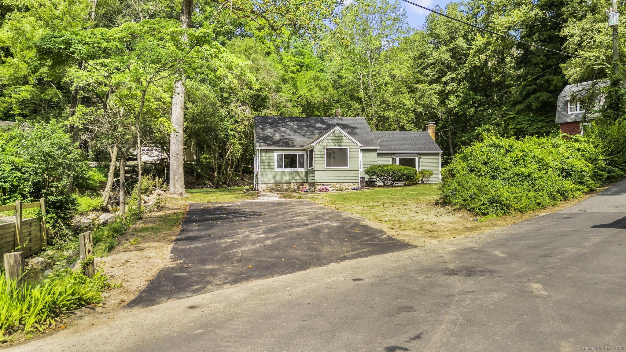 Charming Newtown Cape on a peaceful country road! This 4-bedroom, 2.5-bath home offers fresh interior updates, including new paint, modern light fixtures, and character-filled hardwood floors. Bright living spaces open to a refreshed kitchen with stainless steel range. Outside, enjoy a landscaped yard, private backyard, and two decks for outdoor leisure. Convenient to town center, schools, Lake Zoar recreation, and I-84 for easy commuting. A perfect blend of comfort, updates, and location!