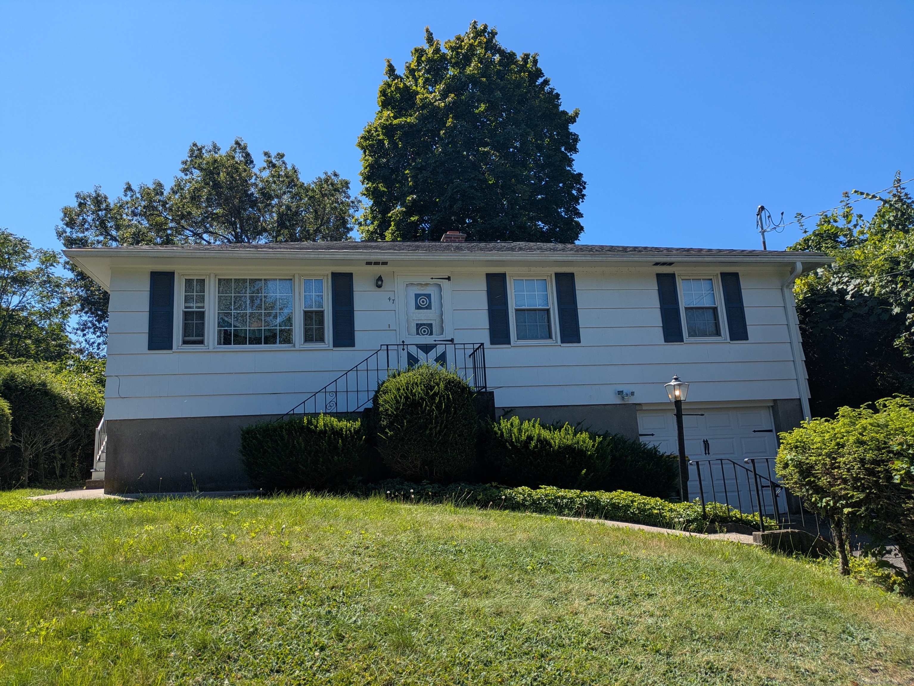 Welcome to this well-maintained 3-bedroom, 1.5-bath ranch located in the desirable East End of Waterbury. This home offers a comfortable layout with an inviting living room, spacious eat-in kitchen, and three main level bedrooms.  The finished basement provides additional living space-perfect for a family room, home office, or gym. An attached garage adds convenience, while the flat backyard is ideal for outdoor gatherings, gardening, or play.  Highlights include:  3 bedrooms, 1.5 bathrooms  Finished basement with versatile living space  Attached garage for easy parking and storage  Flat, usable backyard  Located in the sought-after East End neighborhood, close to schools, shopping, and highways  This home is ready for its next owner to move right in and make it their own!