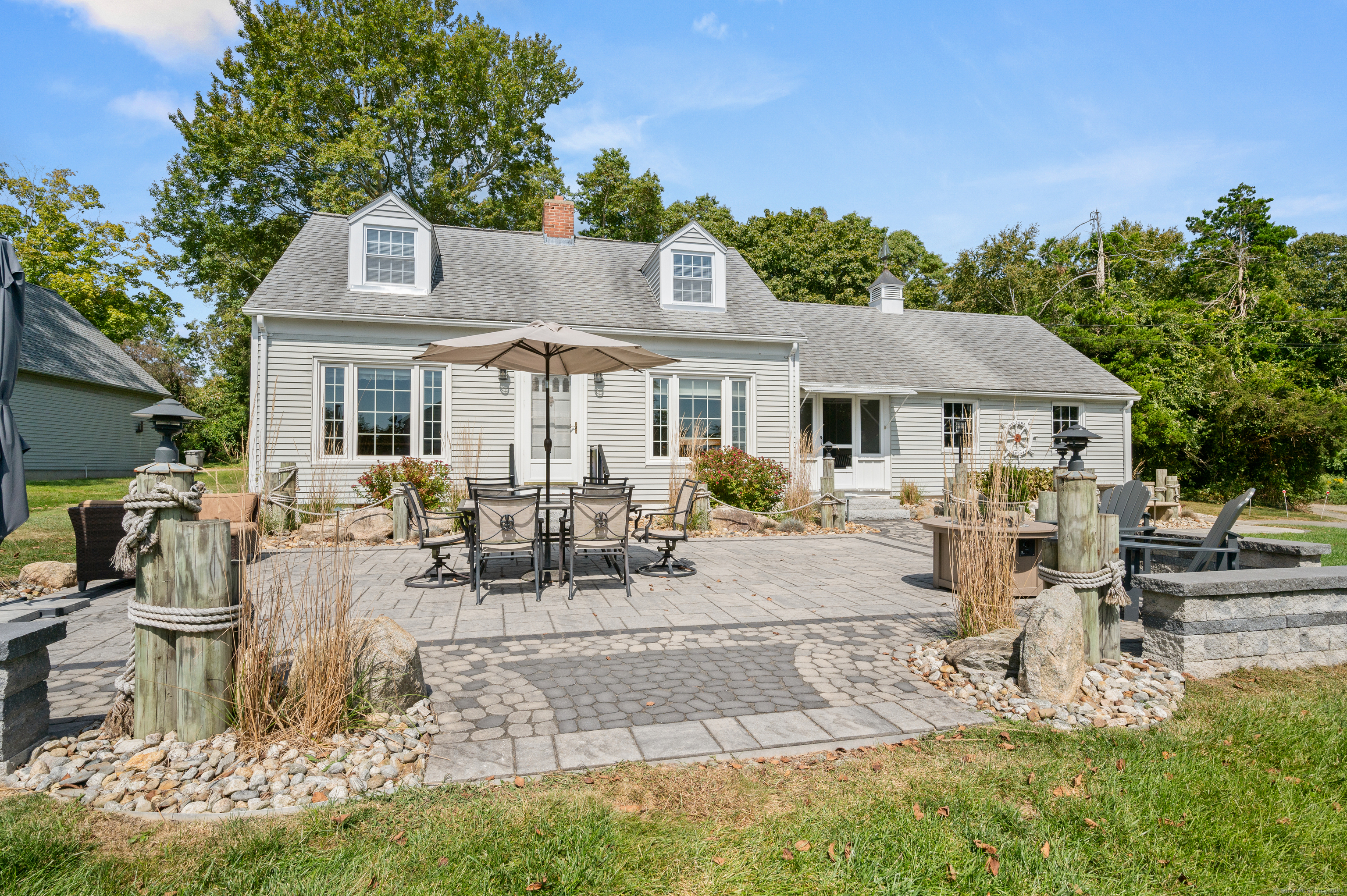 Charming 3 bedroom home available as an academic / winter furnished rental in beautiful Giants Neck Beach Assoc. Enjoy water views from inside or outside from the expansive patio on this expansive private lot at the end of the street. An easy walk to the beach, relax and unwind in this home featuring hardwood floors, a bright and inviting layout, comfortable furnishings and a wonderful three season porch.  The main level features a laundry room and full bathroom in addition to the open kitchen / dinning area and living room. Upstairs there are three bedrooms and a full bath.  Internet, water & lawn maintenance are provided by the landlord. Tenants will be responsible for heat (oil), electricity and snow removal.