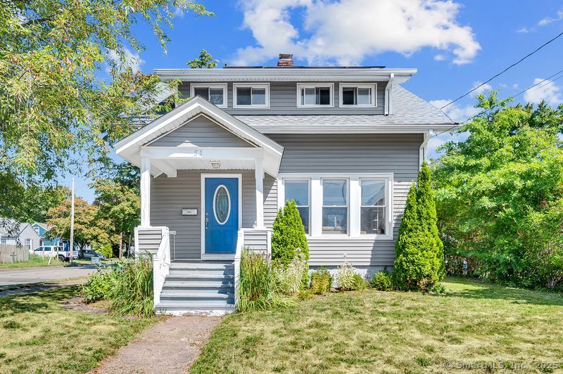 Welcome to 51 Francis Street!! Updated home in desirable neighborhood situated on level corner lot. The first floor features a large living room and formal dining room with hardwood floors. Lovely kitchen with breakfast bar, granite counters, and stainless steel appliances. Updated 1/2 bath and mud room out to deck and fenced yard. Three spacious bedrooms on the second floor, all with hardwood flooring, and full bath with laundry. Lower level is partially finished providing additional living space. Transferable solar panels.