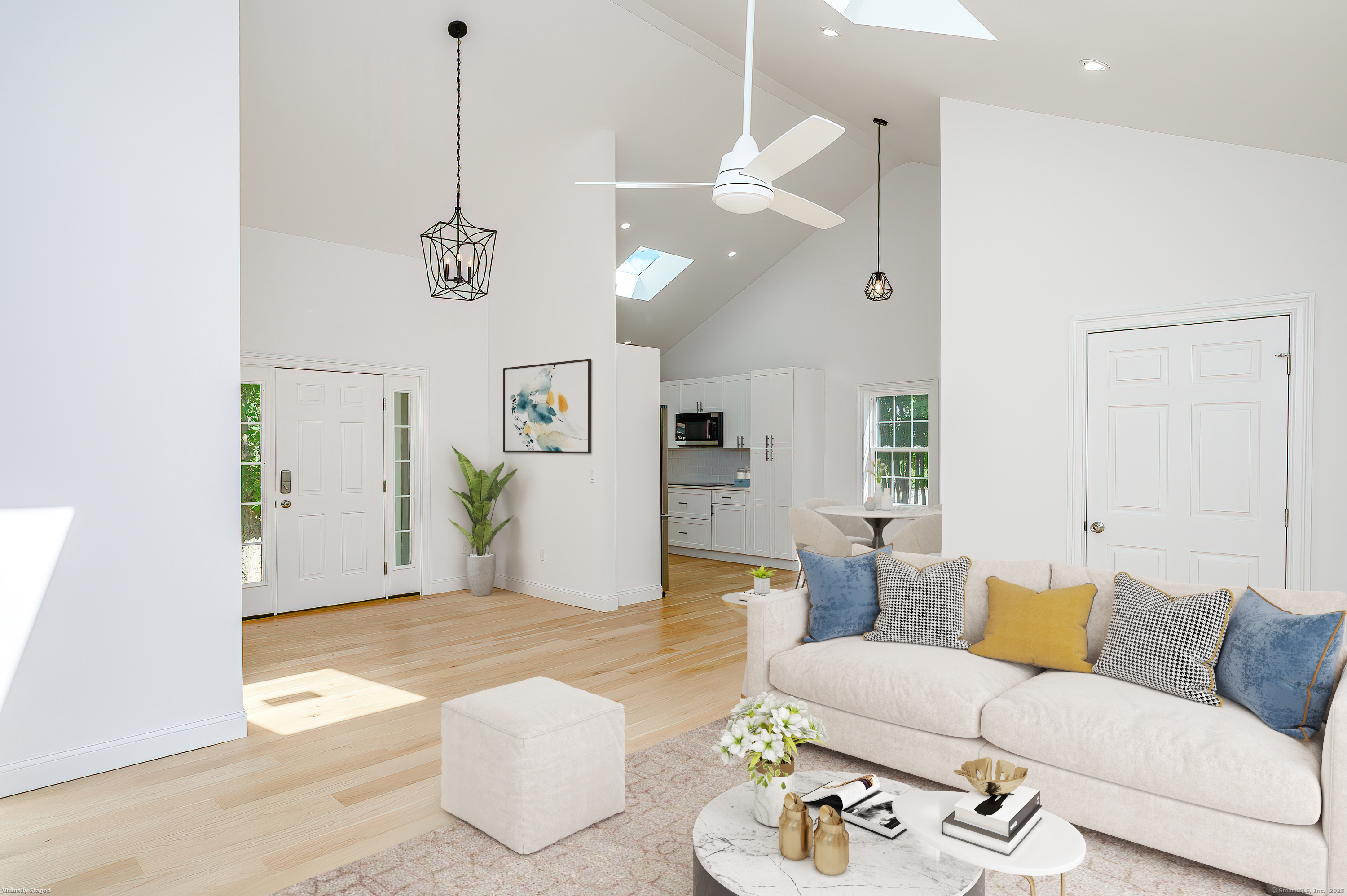 Bathe in sunlight and sea air from this beautifully rebuilt single-level home just moments from Main Street and the Niantic Boardwalk. Featuring 2 bedrooms and 2.5 baths, this modern coastal escape was completely redesigned from the studs up with style, efficiency, and comfort in mind. Step inside to a bright open floor plan with soaring 14-foot ceilings, hardwood floors, and abundant natural light streaming through skylights and oversized glass doors leading to the deck. The brand-new kitchen showcases modern cabinetry, sleek appliances, and a seamless flow into the spacious living area-perfect for entertaining or quiet evenings in. The primary suite offers a spa-inspired bath with a tiled walk-in shower and an oversized customizable closet. A half bath with laundry hookup sits off the kitchen, while the full basement provides excellent storage space. Enjoy outdoor living in the fenced backyard with newly planted Red Maple and White Pine trees, ideal for relaxing or gardening. Additional highlights include a new 200-amp electrical service with Generac transfer switch (generator-ready) and a high efficiency Mitsubishi Hyper Heat system for year round comfort. Perfectly located between Boston and New York, this bright and modern Niantic home combines coastal charm with walkable convenience to shops, beaches, marinas, and restaurants, everything you love about seaside living.