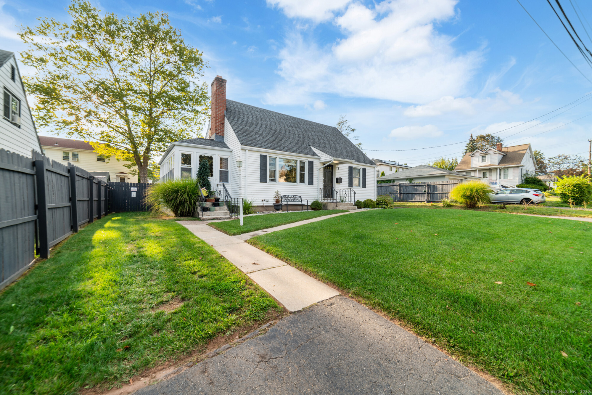This stunning 4-bedroom, 2-bath Cape offers 1,248 square feet of beautifully updated living space. Recently renovated, the home features a newer kitchen and baths, a bright and inviting layout, and a gorgeous finished basement that provides even more room to relax or entertain.    Enjoy the outdoors in the level, fenced-in backyard with a spacious deck-perfect for gatherings and summer barbecues. A large attached garage and newer roof add to the home's appeal, offering convenience and peace of mind.    Located close to highways, shopping, and schools, this home combines style, function, and an excellent location. Ready for You to start your next chapter!!