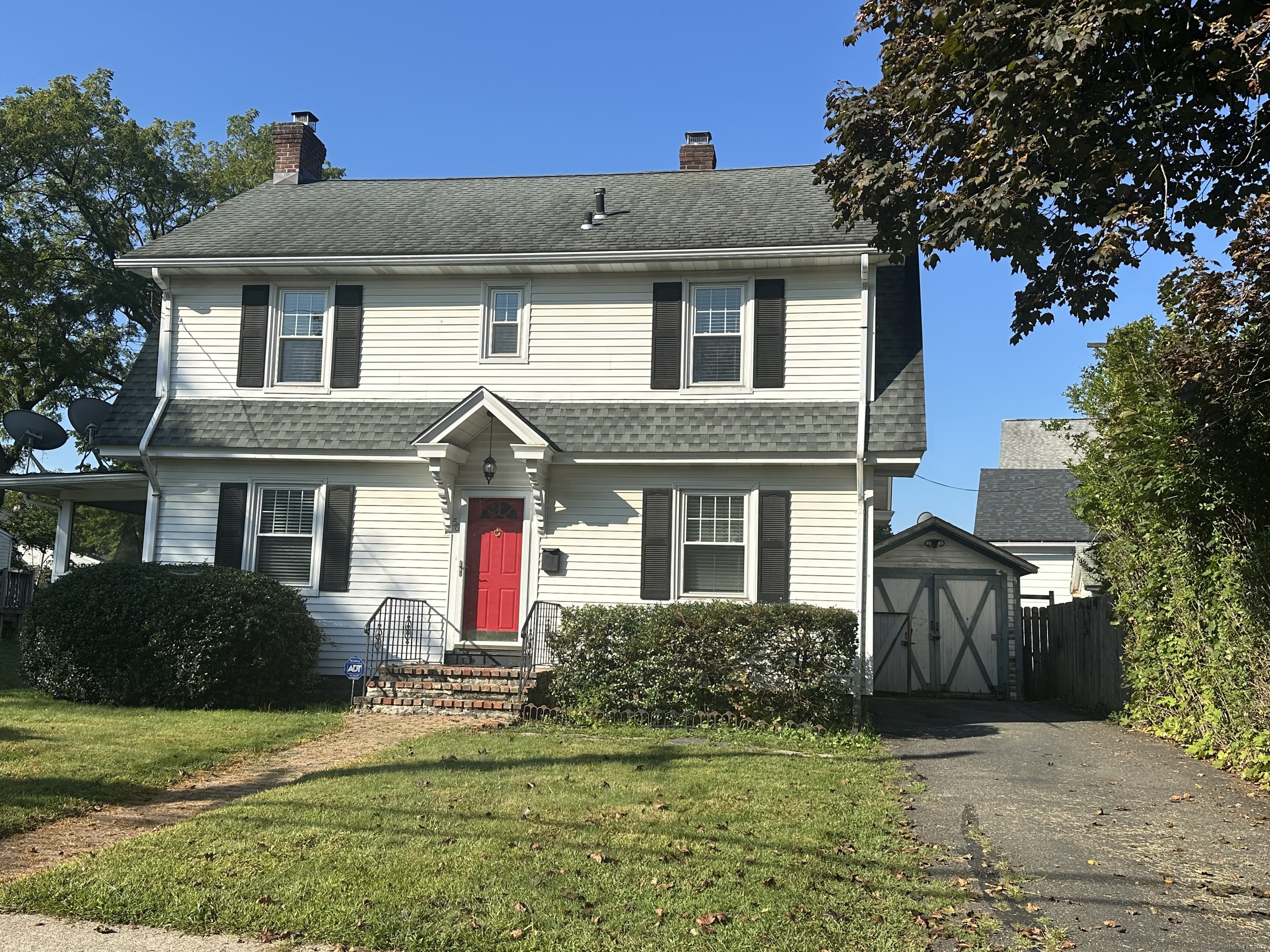 Charming 3-Bedroom Colonial in Danbury with detached one car garage.Welcome to this well maintained 3-bedroom Colonial featuring a warm and inviting fireplace, perfect for cozy evenings at home. The updated kitchen and bathroom offer style and convenience, while the home's mechanical upgrades ensure peace of mind. Some improvements include a new gas furnace and upper-level central air (2016), along with an updated roof and windows. The property features hydro air, two-zone natural gas heating providing comfort and efficiency throughout the seasons. With low taxes under $5,000 and a prime location close to shopping, dining, and all that Danbury, CT has to offer, this home combines comfort, value, and convenience. Don't miss the opportunity to make this charming Colonial your own! Ready to go and priced under $400,000.