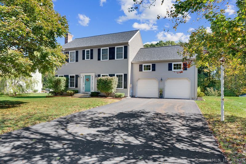 Beautifully maintained one owner home in wonderful neighborhood! Brand new siding and roof in September 2025. Nice floorplan offering a large eat-in kitchen with center island and lots of counterspace. Formal dining room and living room with wood burning fireplace and hardwood flooring. Large family room open to kitchen. Primary bedroom suite with walk-in closet, full bath, laundry space and small room for additional storage, office or crafts! Additional space over the garage ready to be finished. Nice open yard with above ground pool and raised bed garden. Large composite deck for outdoor entertaining. Newer windows, garage doors and driveway. Don't wait!