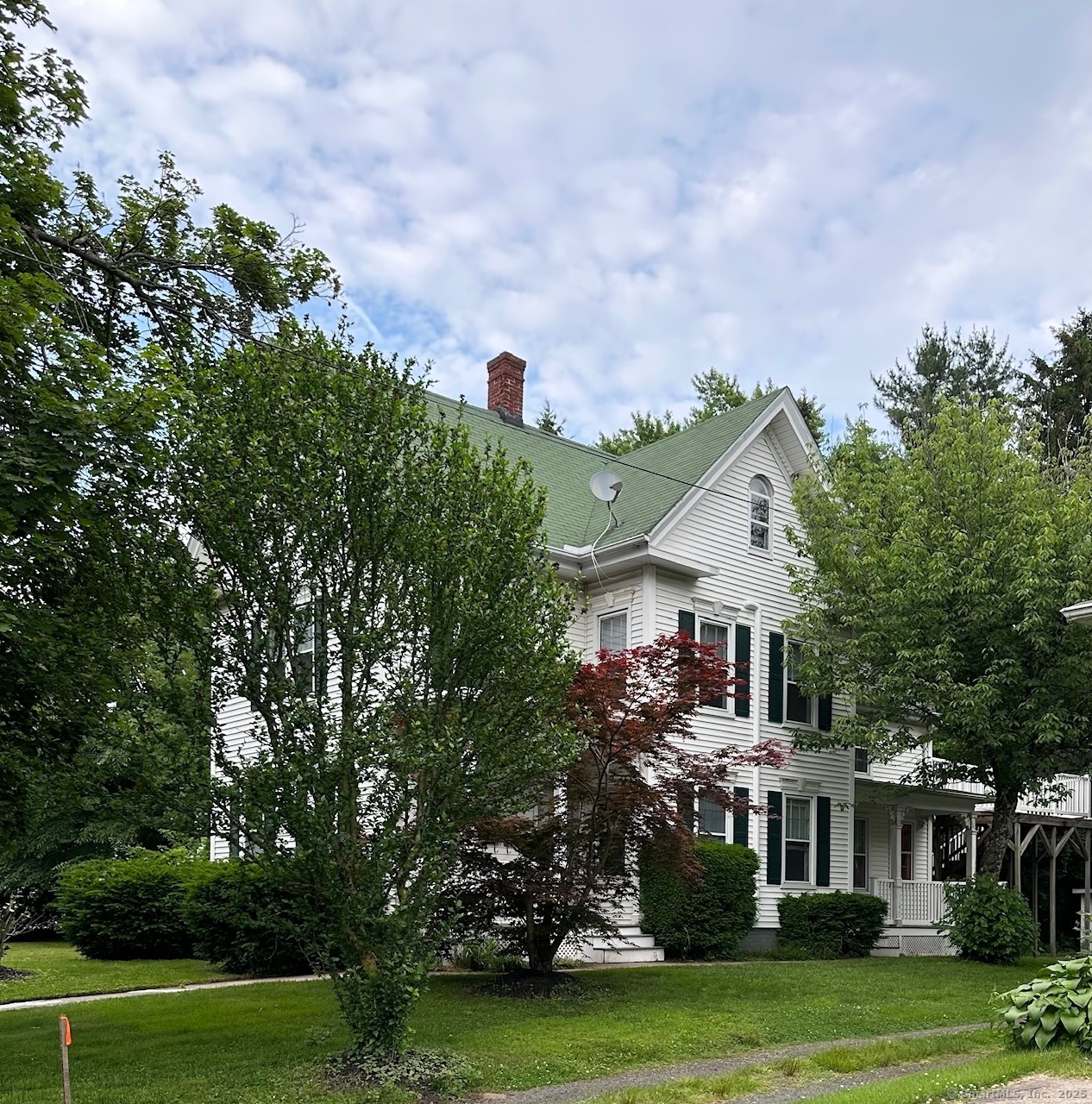 Wonderful two bedroom unit on beautiful North Main Street!!! Walk to downtown and all the charm it has to offer. Shopping, restaurants and so much move.  Gleaming hardwood flooring, great ceiling height and tons of light. Freshly painted with new washer/dryer in unit and keypad lock on rear entrance. Walkup attic with an additional area of storage. Nice deck in the rear for private outdoor living space This unit has four efficient ductless units for heat and A/C with Wallingford Electric. Owner occupied home with 6 months free trash removal. Unit occupancy 2 is preferred.