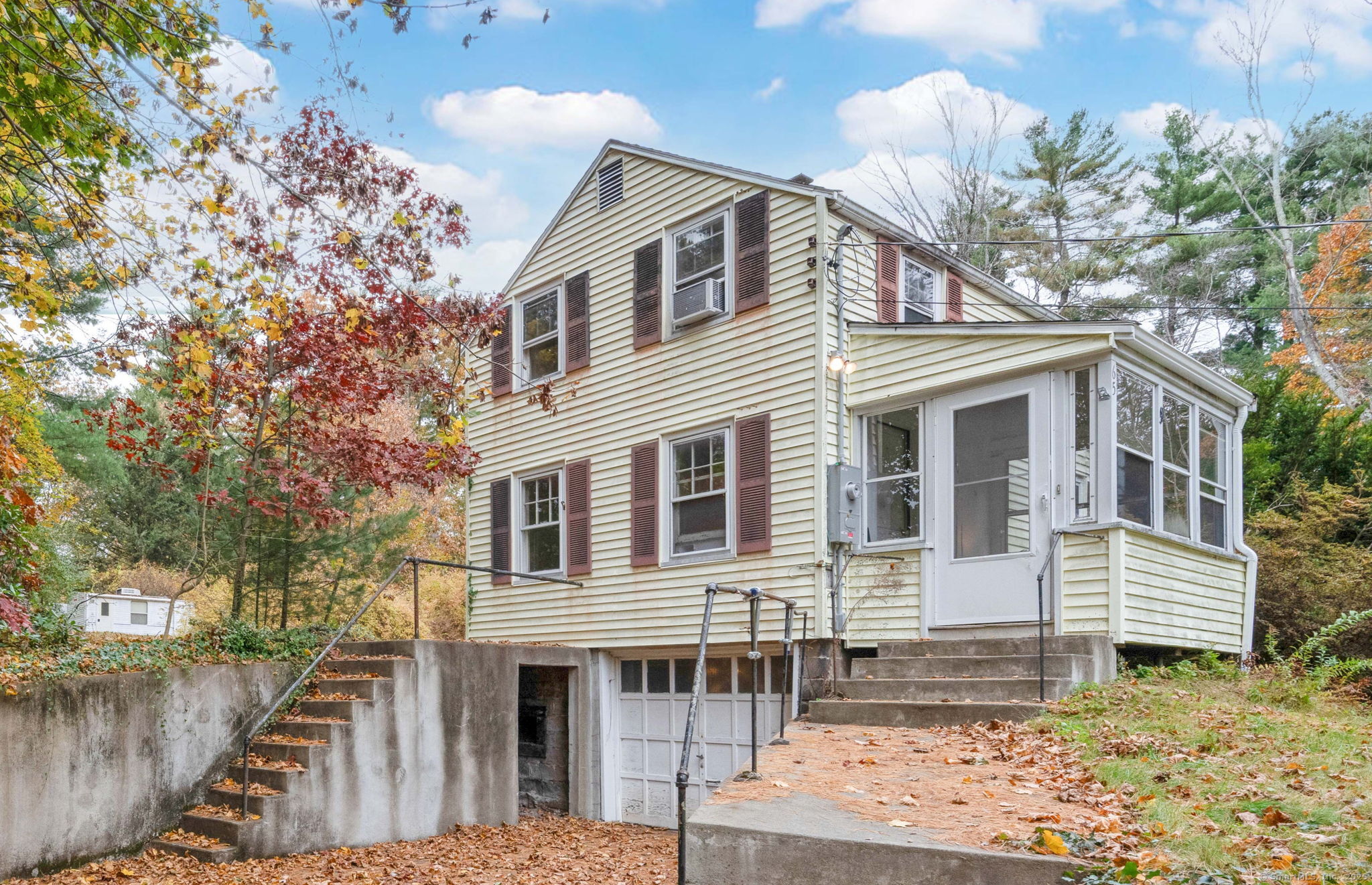 Excellent Simsbury Location with Endless Potential! Nestled on a peaceful street just off Firetown Road, this 1940-built two-bedroom, one-bath home sits on an exceptional almost-3/4-acre lot in a desirable neighborhood. Owned by the same family since it was built-back when Simsbury was farmland-this property offers a rare opportunity to reimagine a true original. Enjoy the quiet setting with a circular driveway, garage under the house, and a private backyard surrounded by mature trees. Electrical was recently updated. While the home requires substantial updates, the setting and possibilities are outstanding. Convenient to Simsbury's shops, restaurants, schools, and recreation. Bring your vision and make this special property your own!