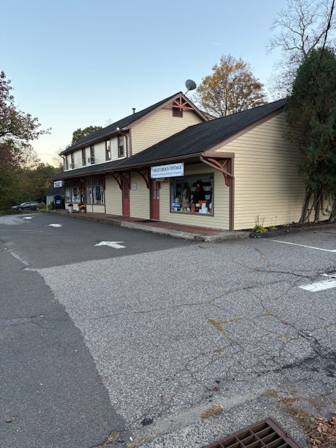 Wonderful Investment Potential! Owner occupied with additional monthly income. Mixed retail and office space with flexibility on square footage. Corner lot with traffic light and high traffic count. Nice lot with 24 parking spaces. Property to be sold "as-is". Broker Owner Related