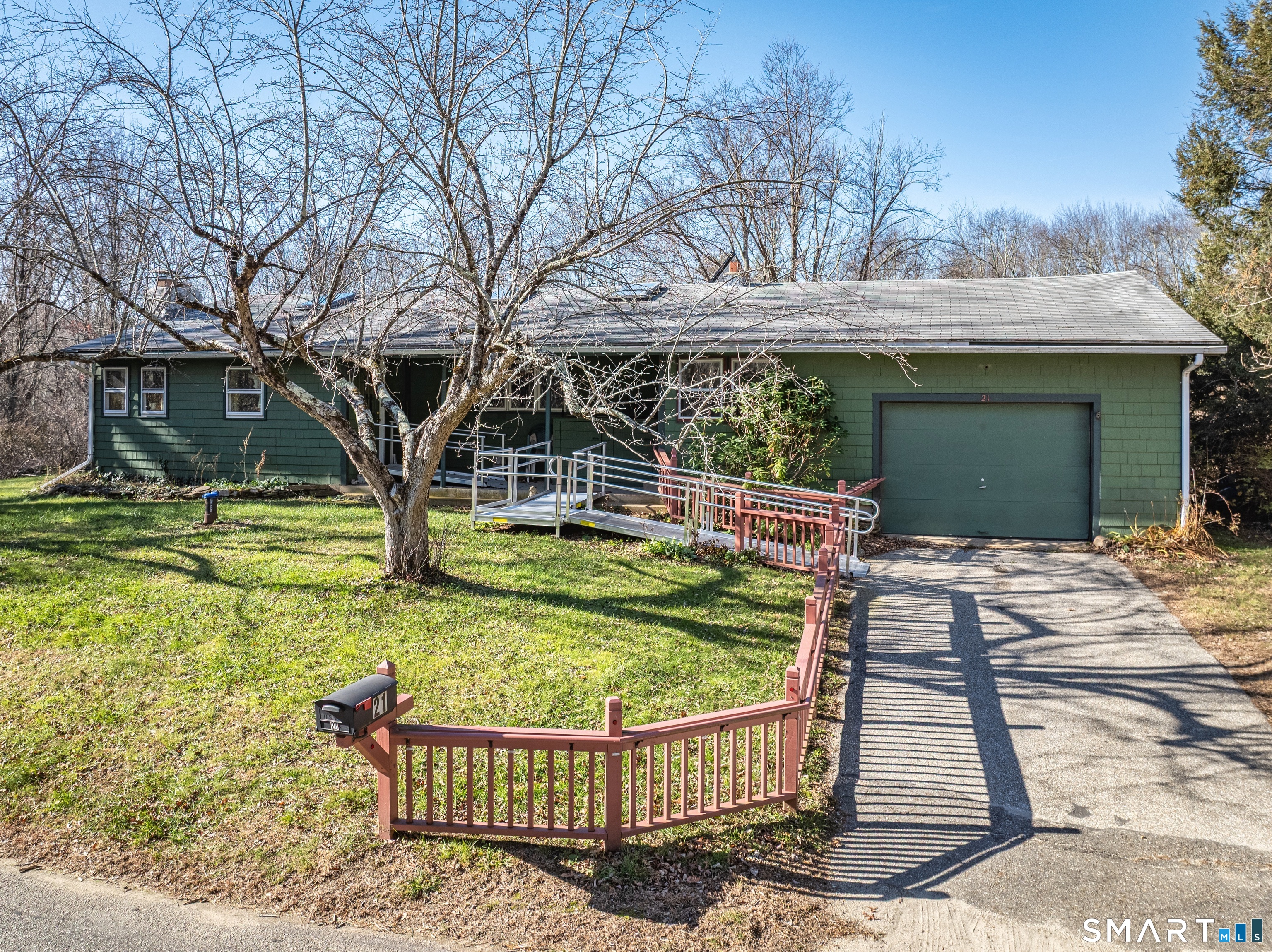 Experience the perfect blend of country charm and academic convenience! Add your own updates to this sun-drenched home featuring an open, airy floorplan and an inviting eat-in kitchen. Relax by the fireplace in main living room, or head downstairs to the partially finished walk-out lower level, which has a second fireplace. This flexible space is perfect for a cozy den or home office. Situated on a serene lot with a spacious storage building, you are just a short distance from the University of Connecticut and Interstate 84. Enjoy the peace of a rural setting without sacrificing proximity to campus amenities. This property offers an incredible opportunity for affordable living in a prime country location. Lots of garden spaces! Septic will be replaced prior to closing.