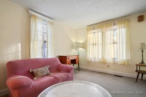 Spacious Living with HARDWOOD FLOORS UNDER CARPETING