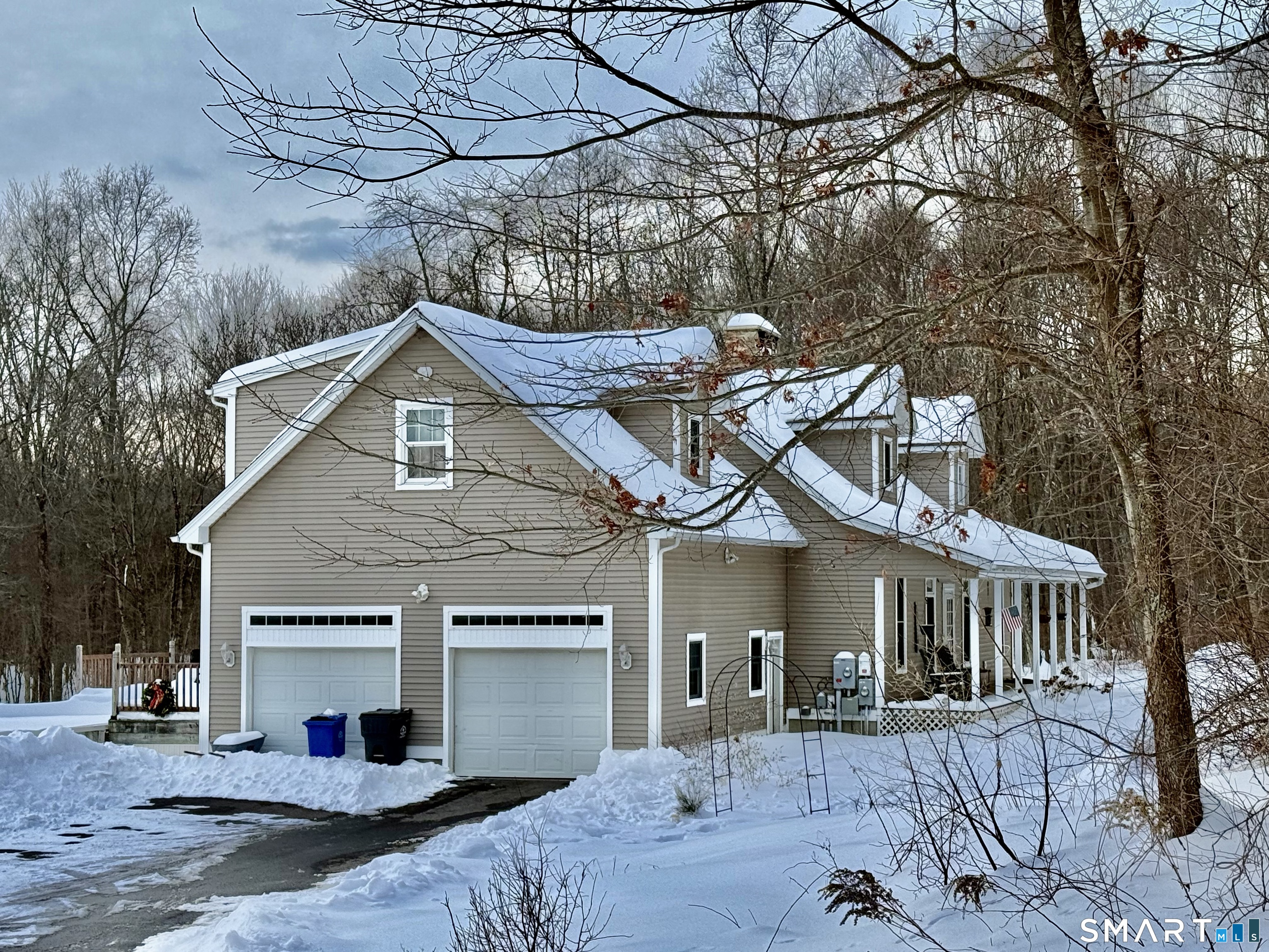 Amazing 8.77 Acres of Privacy with Custom Sprawling 11 Room Cape! Full In Law with Walk out! First Floor Primary Suite Plus 2 Additional Bedrooms and 2 Full Baths! Huge Second Primary Suite on the Second Floor! Central Air! Stone Fireplace! Long Paved Driveway! Wood Floors! Owned Solar Panels! Front Porch! Huge Private Deck! Large First Floor Laundry Room! Unfinished Bonus Room! Newer Paved Driveway, Stainless Steel Appliances, Hot Water Heater, and Baseboard Radiant Heat! So Much to Offer! A Must See!