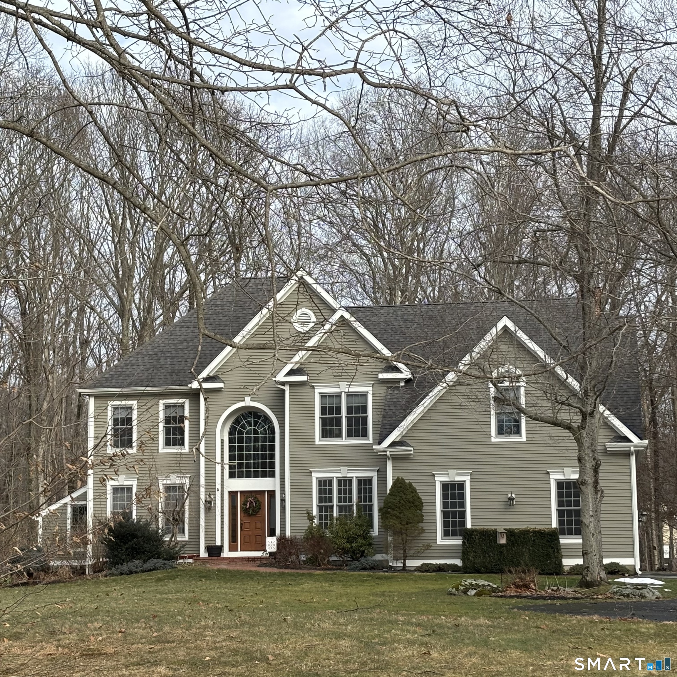 Welcome to the one you've been waiting for. Built in 1995 & thoughtfully updated for today's lifestyle, this home offers the space, layout & location buyers are competing for - without the delay of new construction. Step into a dramatic two-story foyer with a sweeping turned staircase that immediately sets an impressive tone. The open floor plan flows effortlessly into the vaulted family room with a wood-burning fireplace, seamlessly connected to a beautifully remodeled kitchen - the true heart of the home. Sliders lead to a spacious deck overlooking a large, level backyard perfect for entertaining, play or future outdoor enhancements. The front-to-back living & dining rooms showcase hardwood floors & provide elegant yet flexible gathering spaces. A private first-floor office meets today's work-from-home needs with ease. Upstairs, a balcony overlook adds architectural interest & openness. The primary suite features hardwood floors & a remodeled full bath, while three additional generously sized bedrooms, a second updated full bath & a full second-floor laundry room offer comfort & convenience for everyday living. Located in a highly desirable neighborhood where newer homes are selling for $900K & above, this property represents exceptional value in an established setting. Why wait & pay more for new construction when you can secure this prime location now? Homes in this area do not last - schedule your showing & make it yours.