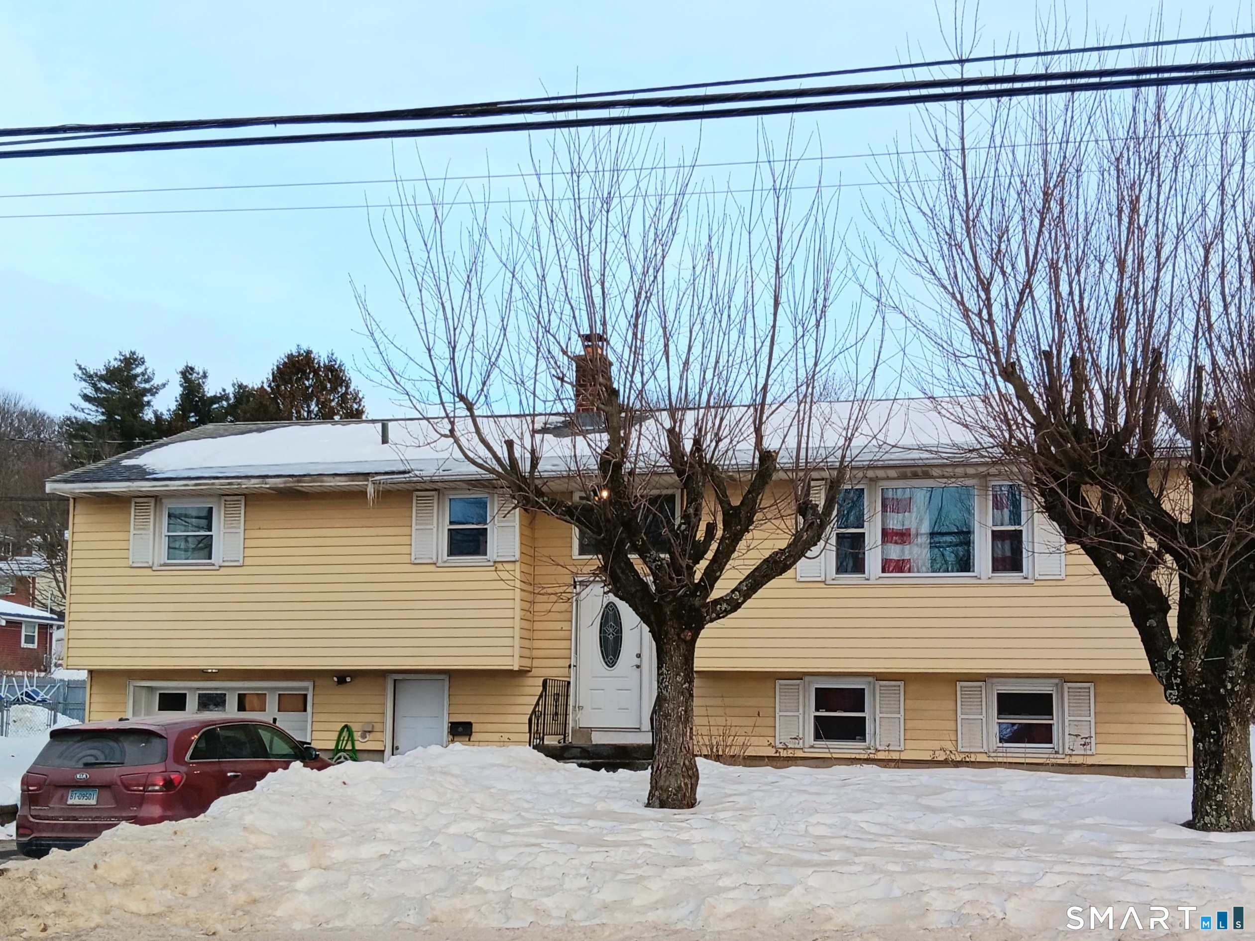 Spacious 9 room 2012 S.F. East End Raised Ranch with 4 bedrooms, 2 full baths 2 kitchens and 1 car oversized basement garage. The 1292 SF main level is completely remodeled with beautiful new hardwood and marble floors, an updated eat-in kitchen with a breakfast nook, newer appliances and granite counters. Open to a very spacious L-shaped living room and dining room. The main level bathroom is redone and the 3 roomy bedrooms have new doors and hardware. There is a 720 SF completely finished lower level with a family room, bedroom, second kitchen and full bath. Great for the in-laws with a separate entrance. The lower level garage has been finished into a room but can easily be disassembled. The mechanicals include a new, top of the line Weil Mclain boiler, a new electric Hot Water Heater and separate central air conditioning. Level fenced yard with a rear patio. Close to schools, recreation area, and shopping. Hurry, this great home won't last long.
