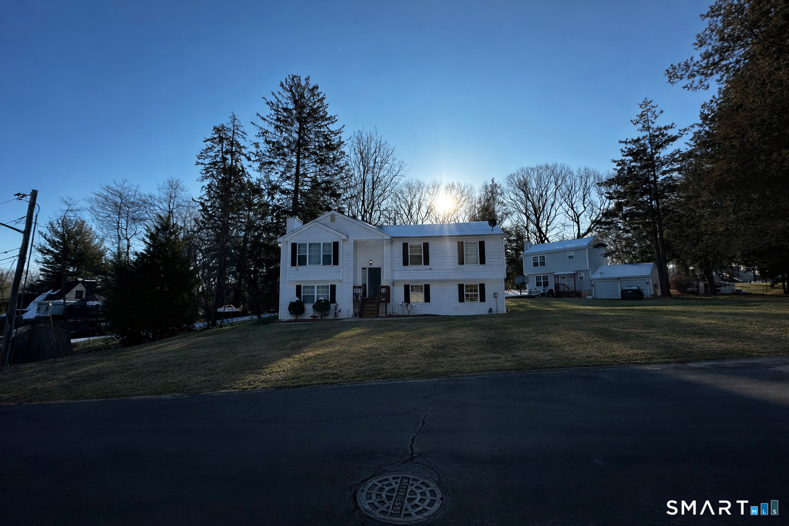 The residence presents a well-maintained, refined interior with a thoughtful layout and abundant natural light throughout the main level, creating an inviting and polished living environment.  The finished lower level includes two additional rooms and a full bathroom, offering flexible space suitable for office, guest, or possible in-law suite.  Set within a well-established residential setting, the property enjoys convenient access to shopping, dining, and major commuter routes. An excellent opportunity for owner-occupants or investors seeking a residence with additional finished space and strong location appeal.