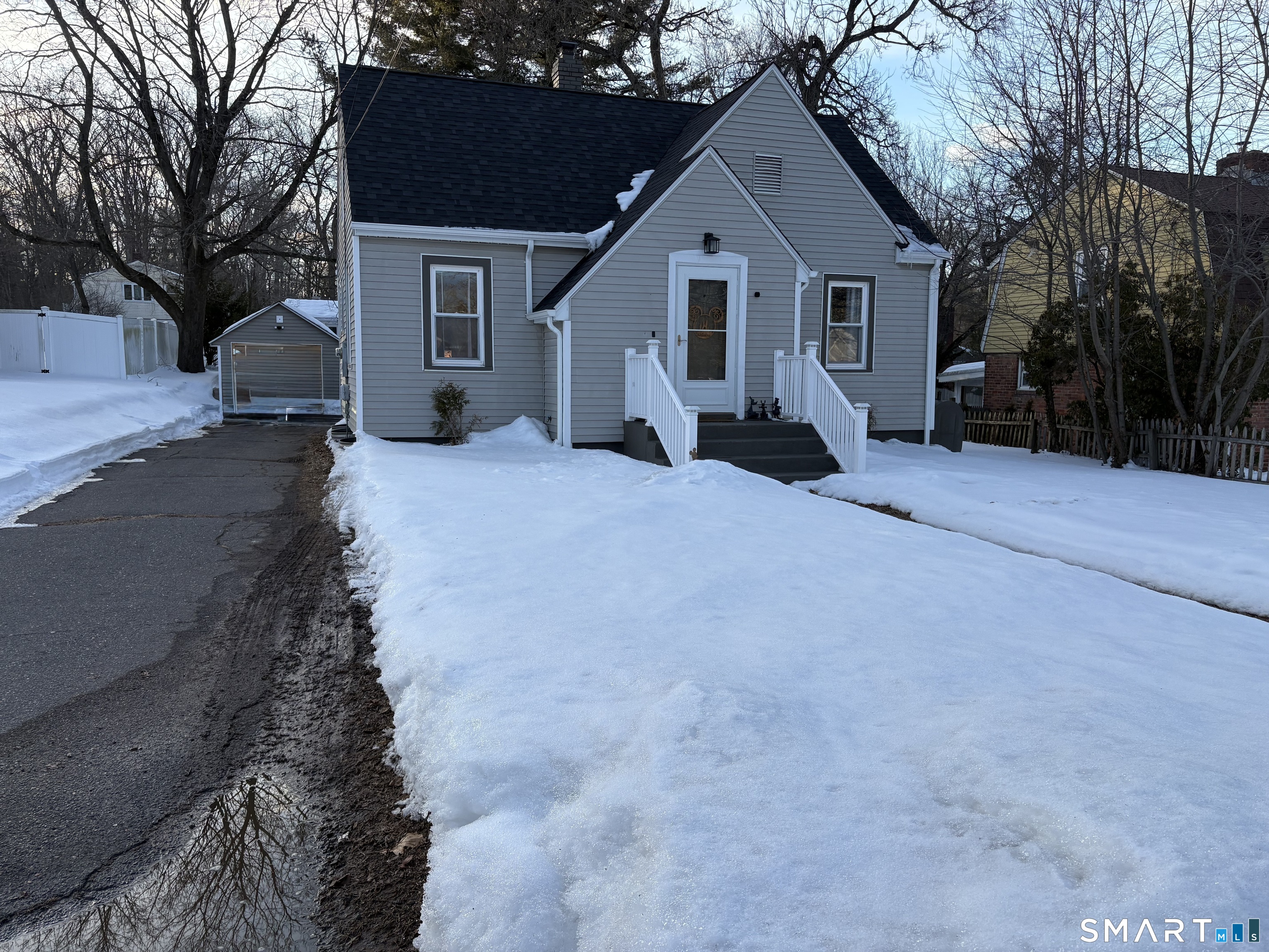 Wonderful alternative to condo or apartment living. Come see this beautifully updated 2-3 bedroom, 1bath Ranch-style home offering classic New England charm w/extensive modern upgrades throughout. This move-in ready property provides the perfect blend of character, functionality, & peace of mind. The main level features gleaming hardwood floors in the living area, a fully renovated bath & kitchen complete w/tile flooring, stainless steel appliances, quartz countertops, a peninsula w/seating & additional storage ideal for both everyday living & entertaining. Town records reflect 2 bedrooms; however, a 3rd legal br has been added in the finished lower level. The finished basement also includes a versatile room perfect for a home office, playroom, gym, or flex space, all enhanced with durable LVP flooring. Major improvements done a year ago provide exceptional value, including a new roof, all new electrical throughout, new plumbing, new baseboard heaters, & a new boiler. Offering long-term efficiency/reliability. Additional highlights include an enclosed porch, spacious yard ideal for gatherings or gardening, a detached 1-car garage, a paved driveway w/room for 2-3 additional vehicles.Conveniently located near I91 & rt9, shopping plazas, restaurants, TPC River Highlands golf course, this home offers small town charm with commuter friendly accessibility. Don't miss this opportunity to own a thoughtfully updated home in a prime Cromwell location!