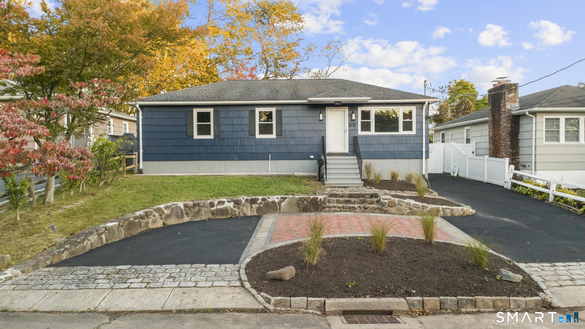 Pull into your charming half circle driveway and instantly fall in love with this home's incredible curb appeal. Featuring a fully fenced-in yard, spacious deck perfect for entertaining, and a handy storage shed, outdoor living has never been better. Inside, the main level offers three bright bedrooms and a beautifully updated kitchen & full bathroom. The lower level expands your living possibilities with two additional bedrooms, a full bath, and flexible spaces ideal for a playroom, home gym, or guest suite. Located just blocks from the beach, this home perfectly blends comfort, versatility, and coastal convenience. Actual bedroom count is 5 field card reflects 3