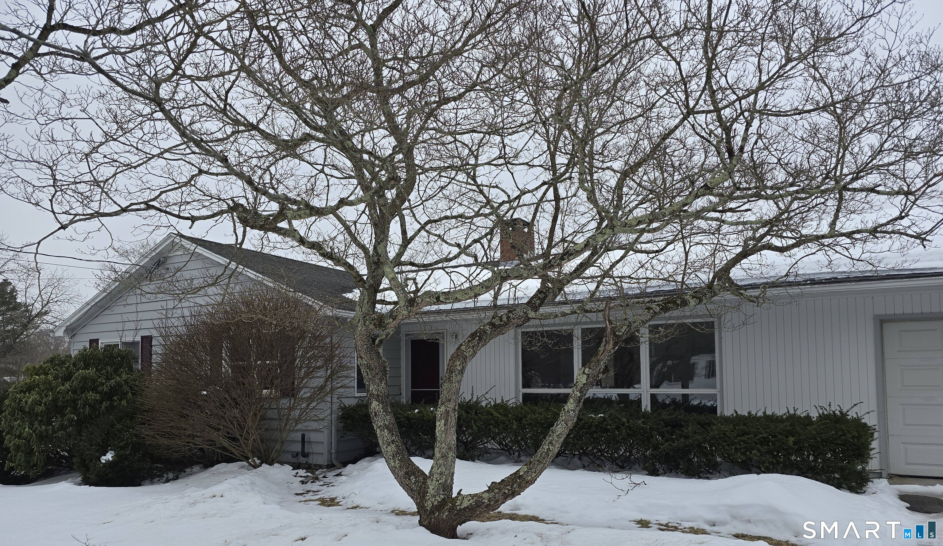 Welcome to 248 Old Salem Road in Bozrah - a classic single-family home offering comfort, space, and peaceful surroundings. This 3-bedroom home features gleaming hardwood floors that flow through the main living areas, creating a warm and inviting atmosphere. The living room is anchored by a brick fireplace centerpiece, perfect for cozy evenings and gathering with family and friends. The kitchen offers ample workspace and connects seamlessly to the dining area, making everyday living and entertaining easy. With two full bathrooms and one half bath, the layout provides flexibility for guests and daily routines. An unfinished basement offers excellent storage or future expansion potential. Step outside to enjoy the screened-in porch overlooking a beautiful pastoral backyard view - an ideal setting for morning coffee or relaxing at the end of the day. The gable roof and vertical siding add classic character, while oil heat provides reliable comfort throughout the seasons. Set in a peaceful Bozrah location with convenient access to nearby amenities, this home offers both charm and opportunity.