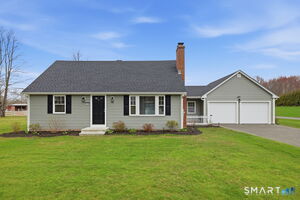 This home has great curb appeal and the newer driveway adds to the charm of this home