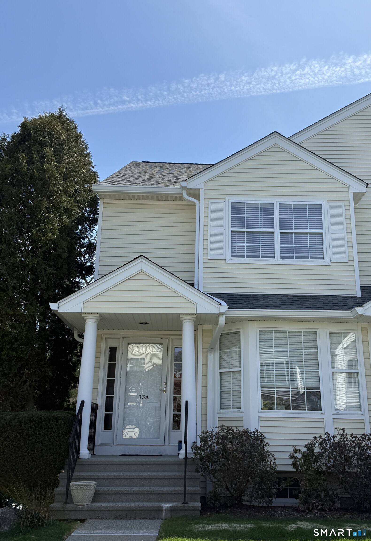 Welcome to this beautiful, turn-key end-unit townhome offering effortless living in the highly sought-after Riverturn complex. The inviting main level features gleaming hardwood floors and an open floor plan, including a well-apointed Living Room with gas fireplace and sliders to a private deck, seamlessly flowing into the Dining Room. A granite eat-in Kitchen and convenient Powder Room complete the first floor. Upstairs, the spacious Primary Bedroom showcases a wonderful vaulted ceiling, hardwood floors, two generous California closets and a Full Bath with a whirlpool tub & separate shower. A second large Bedroom also enjoys hardwood floors and a generous closet along with access to the hall Full Bath, making it perfect for guests or family. The finished, sun-filled loft with skylight provides flexible space for a home office, gym, or additional living area, along with added walk-in storage. The lower-level Family Room offers bright, versatile space and direct access to the laundry area and one-car garage. Enjoy serene surroundings with views of the charming courtyard in front and a peaceful river backdrop from the deck. Ideally located just minutes from the Merritt Parkway, shopping, dining, Downtown, and Harbor Point, this home truly offers the best of suburban living with convenience at your doorstep.