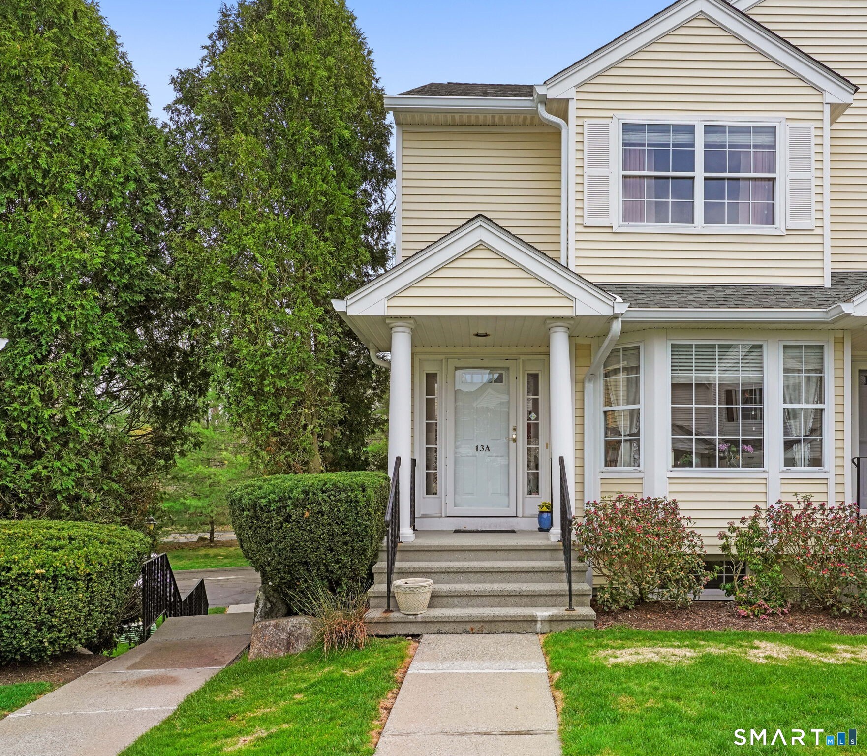 Welcome to this beautiful, turn-key end-unit townhome offering effortless living in the highly sought-after Riverturn complex. The inviting main level features gleaming hardwood floors and an open floor plan, including a well-apointed Living Room with gas fireplace and sliders to a private deck, seamlessly flowing into the Dining Room. A granite eat-in Kitchen and convenient Powder Room complete the first floor. Upstairs, the spacious Primary Bedroom showcases a wonderful vaulted ceiling with skylight, hardwood floors, two generous California closets and a Full Bath with a whirlpool tub & separate shower. A second large Bedroom also enjoys hardwood floors and a generous closet along with access to the hall Full Bath, making it perfect for guests or family. The finished, sun-filled loft with skylight provides flexible space for a home office, gym, or additional living area, along with added walk-in storage. The lower-level Family Room offers bright, versatile space and direct access to the laundry area and one-car garage. Enjoy serene surroundings with views of the charming courtyard in front and a peaceful babbling brook backdrop from the deck. Ideally located just minutes from the Merritt Parkway, shopping, dining, Downtown, and Harbor Point, this home truly offers the best of suburban living with convenience at your doorstep.