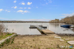 Short Walk to Assn beach area with fire pit, kayak storage and a dock for boats. $150 a year fee.