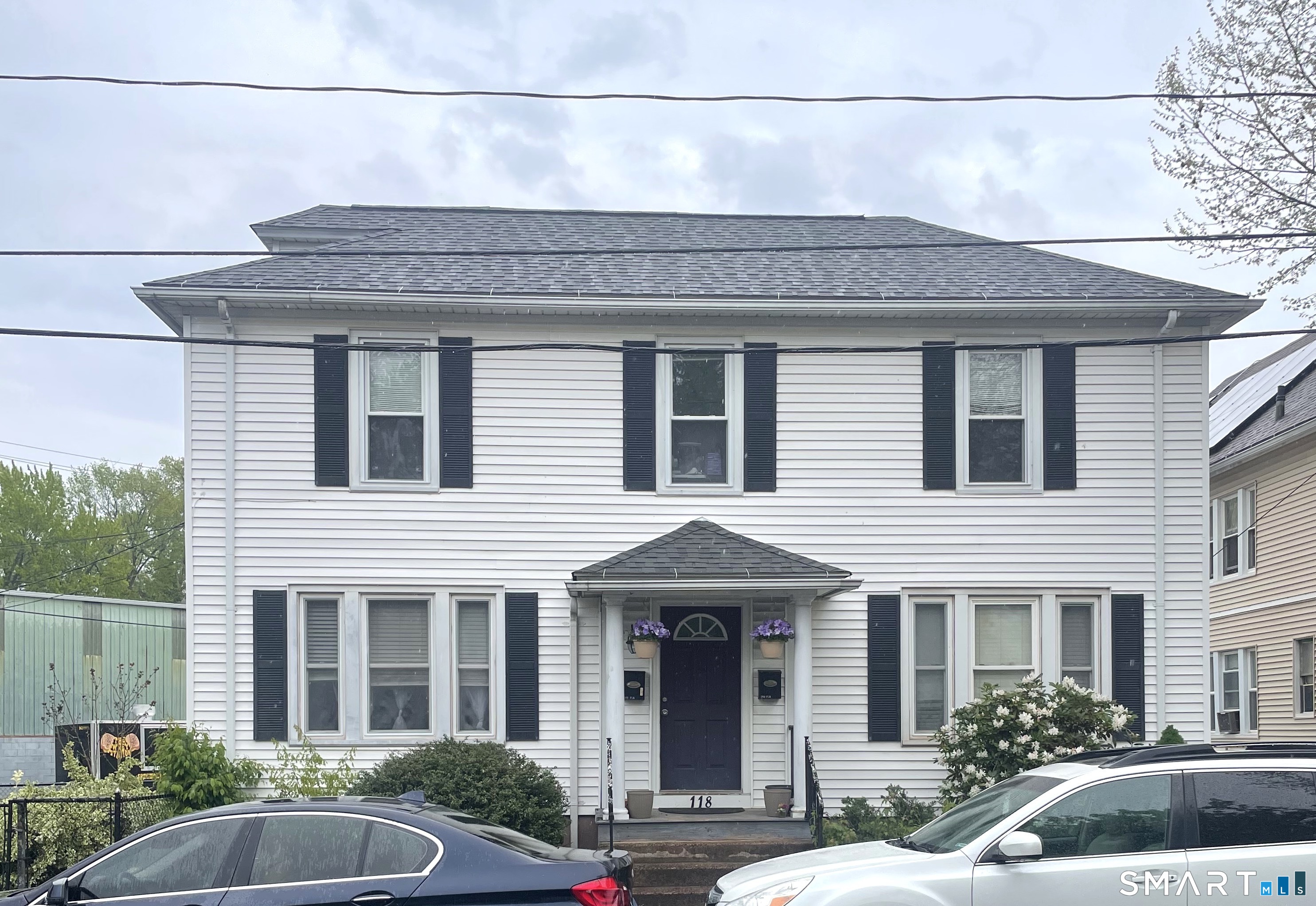 Welcome to 118 Grove Street, a well-maintained two-family property located in the heart of Middletown. Situated on a quiet corner lot in a desirable neighborhood, this home is just minutes from downtown Middletown and Wesleyan University. This property is easy to manage and ideal for both owner-occupants and investors, featuring natural gas, separate utilities, two electric panels, and laundry in each unit. The first-floor unit offers two bedrooms, one full bath, and a formal dining room accented with beautiful crown molding and classic charm throughout. The second-floor unit is a spacious one-bedroom, one-bath layout featuring abundant natural light and a comfortable, functional floor plan. Whether you are looking to expand your investment portfolio or occupy one unit while generating rental income from the other, this property presents a fantastic opportunity. Schedule your showing today! Agent is related to Seller.