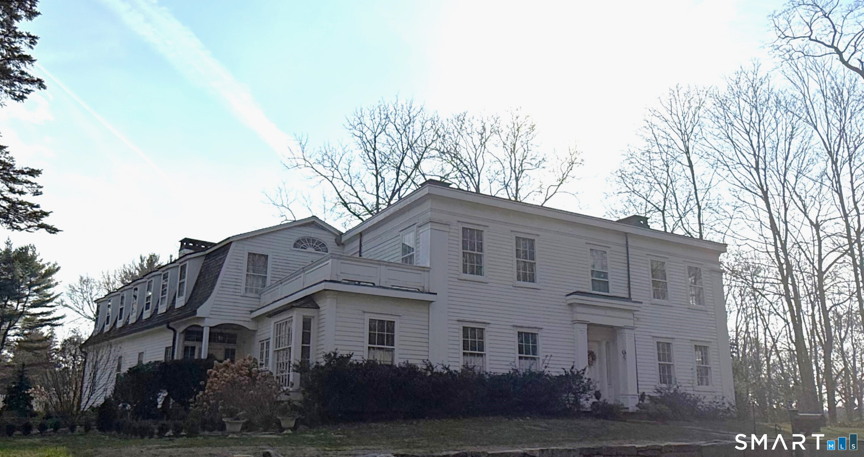 Offering a warm blend of 19th-cent character & modern updts, this 1860 Greek Revival Col showcases truly distinctive features. Despite its expansive 5,358sf, the home feels inviting & intimate, highlighted by rustic design elements incl brick hallways & accents. Orig rich random width pumpkin pine plank flrs recently refin 10' clgs thru-out & 5FPs. Set on 1.22 lvl acres w/specimen trees, this special property offers a peaceful, prvt setting in desirable Westover-just moments from city amenities. The orig residence, believed to be the orig area farmhse, feat a gracious LR & DR both w/FPs, Kit w/access to charming Bkfst Rm, Full Bth & unique brick hallway w/sunlit nooks ideal for reading, gardening & relaxing. An award-winning late 1960s addition recognized for architectural accuracy of design & craftsmnshp, enhances the home w/stunning FR feat a wall of blt-ins & spacious Den-both w/FPs & wonderful windows flooding the space w/natural light. Upstairs you'll find a priv & spacious PBR w/FP & en-suite Full Bth. 4 add'l BRs, 3rd Full Bth w/Laundry, & a framed space ready for an add'l bth, +a bright, airy Bonus Rm. Dramatic walls of floor-to-clg windows overlook the brick patio & beautifully landscaped grounds. The lvl, fenced yard w/mature plantings provides a serene outdoor retreat perfect for relaxation and entertaining. This wonderful home features brand new mech sys incl C/A, Furnace, Wtr Htr, Boiler & Well Purification sys.
