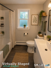 Second floor full bathroom virtually staged.
