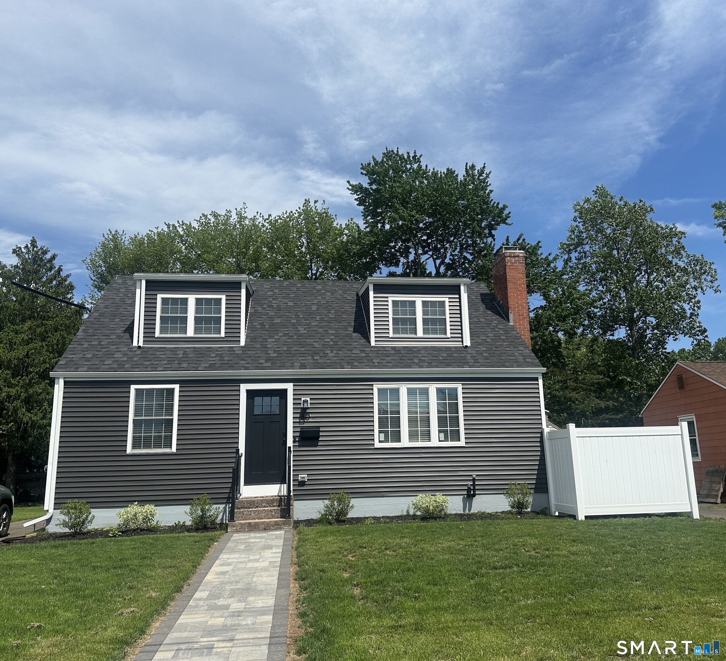 Beautifully completely renovated and move-in ready, this charming 3-bedroom, 2-bath Cape Cod home is perfectly situated in the heart of Middletown. Step inside to a warm and inviting living room featuring a classic fireplace, then continue into the stunning fully remodeled eat-in kitchen. The main level offers two comfortable bedrooms and a beautifully updated full bath. Upstairs, the spacious primary suite provides a peaceful retreat complete with a dedicated office area, abundant built-ins, and a full bath with a walk-in shower. Laundry facilities are in the basement. Outside there is a lovely private patio-ideal for morning coffee, outdoor dining, or simply unwinding at the end of the day-and a one-car garage with a shed built-on. More photos coming soon!