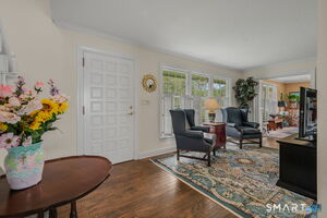 Large entry foyer with seating area.