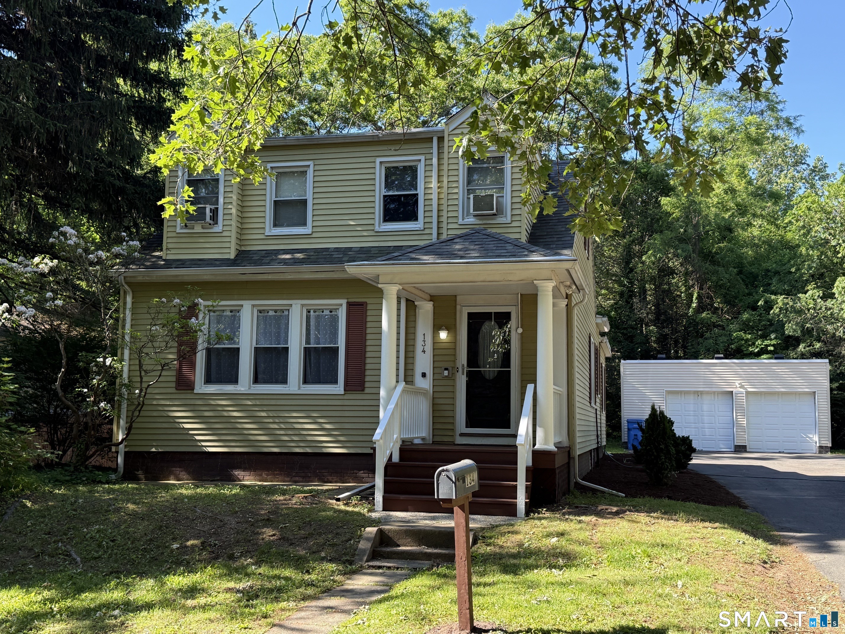 Great Mount Carmel Hamden location!! Five bedroom home with 2 full baths situated on oversized lot. Large living room with built-ins. Lots of charm!! Hardwood flooring, spacious eat-in kitchen, generous pantry and so much more. Private deck and oversized 2 car detached garage. Convenient to Quinnipiac, Yale, I-91, Route 15. The fifth bedroom on the main living level can easily be converted back to formal dining room. Broker/Owner. Don't wait!