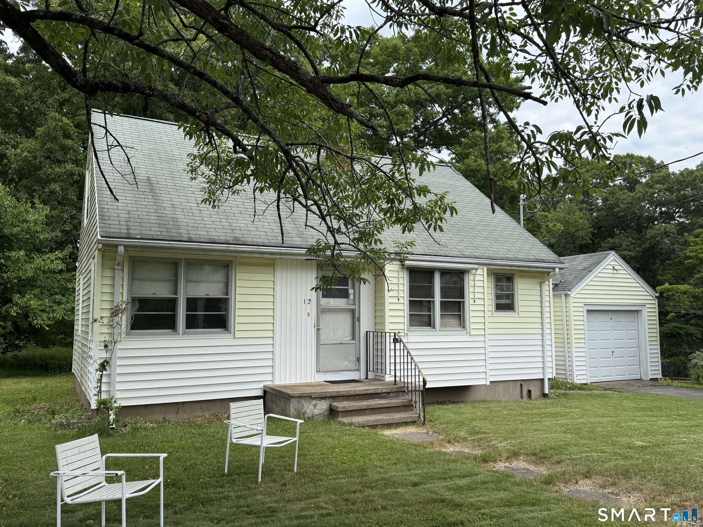 Adorable Cape in great Yalesville location!! This charming cape has been in the same family since it was built and is waiting for its next owner. Nicely sized rooms and hardwood flooring throughout. Rear family room/dining room space with woodburning stove. Two large bedrooms on the second floor with area for office or reading nook. Breezeway/mudroom with access to the rear yard. Large lot with pretty brook in the rear of the property. Convenient location for shopping, schools, and hospitals. Property to be sold "as-is"