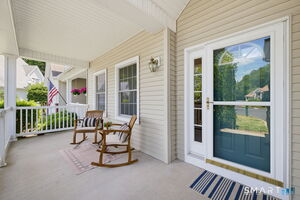 The front porch that's perfect for morning coffee.