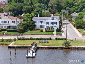 Stunning Unobstructed Water Views with Private Dock and Direct Waterfront on The Mystic River.