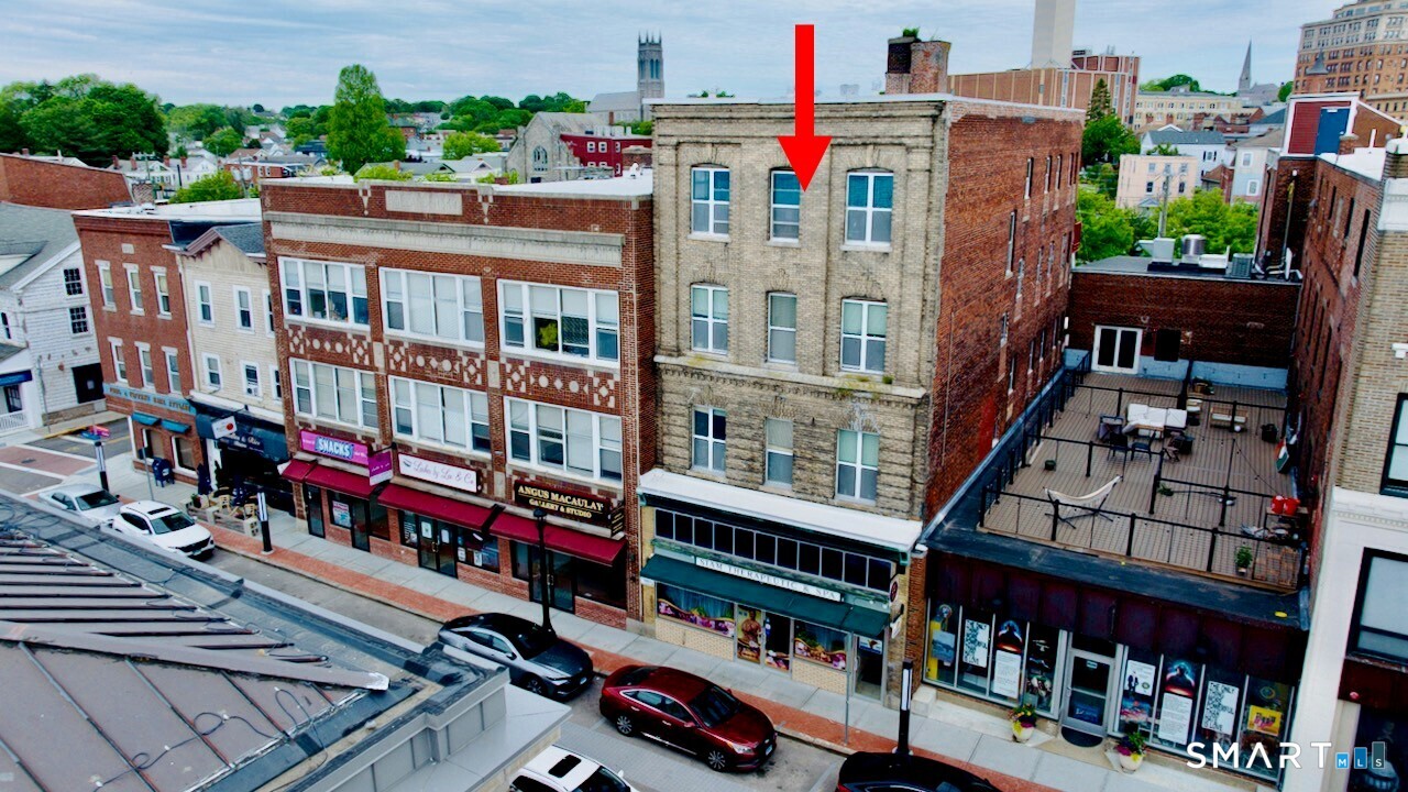 Fully leased, mixed-use property located in the heart of downtown New London. This 11,894 SF, 2 story building has a 3,193 SF commercial space on the 1st floor and 3 apartments on 5,508 SF on the second floor. There is a 3,193 SF basement.  The apartments have high ceilings, large windows and beautiful views of the Thames River. Building was fully renovated in 2017. NOI approximately $76,536. Call office for financials. Excellent investment property with stable cash flow. Property may be purchased as a package with 53 Bank St and 153 Bank Street for a total of 6 commercial units and 17 Apartments.  Aerial Footage: https://tinyurl.com/147-153bankstreet