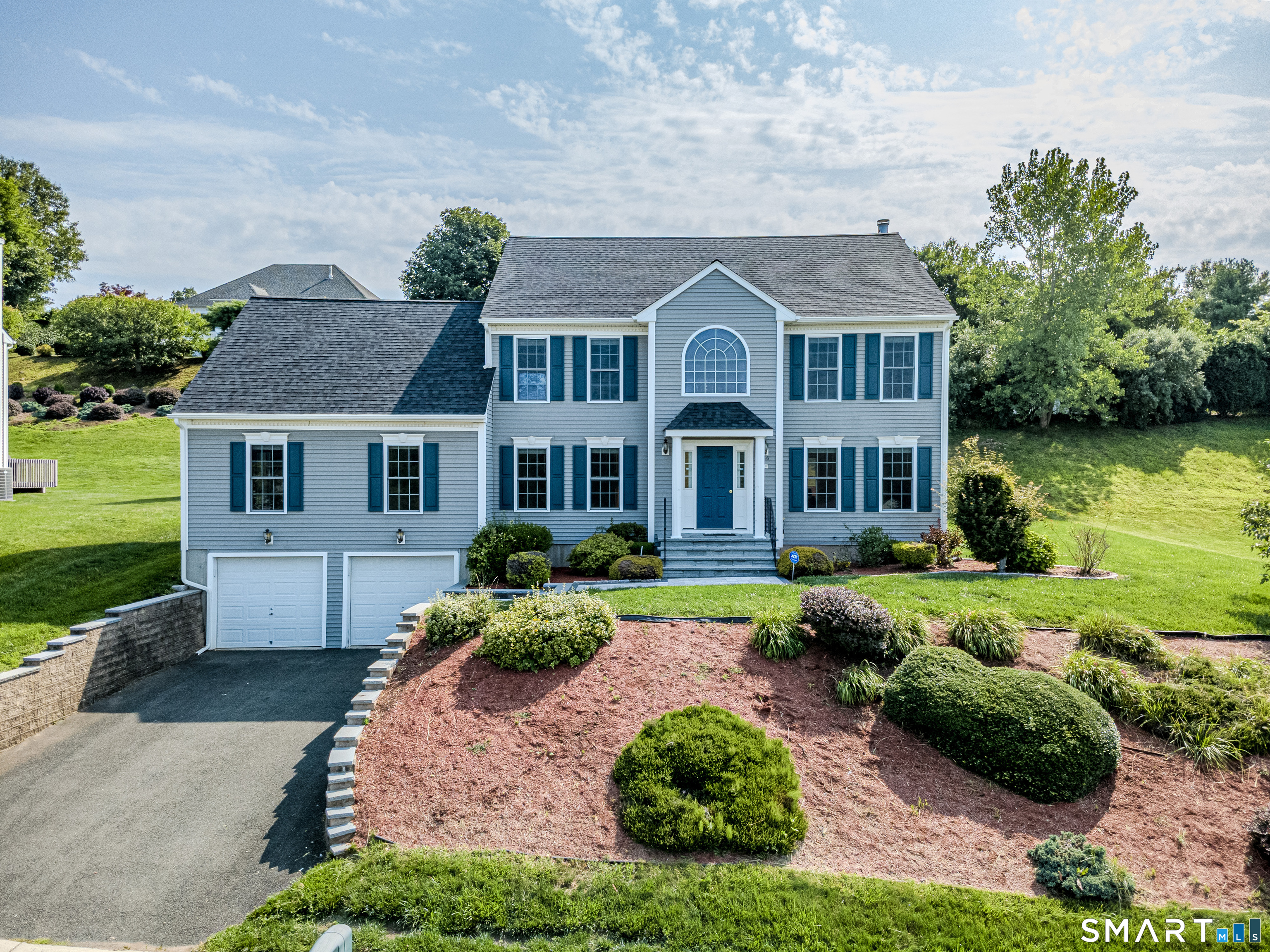 Welcome to this beautifully maintained 4+-bedroom, 2.5-bath Colonial conveniently located in the heart of Middletown. Freshly painted and move-in ready, this home offers the rare combination of generous living space, flexible room options, entertaining areas, and valuable recent updates-including a new roof in 2025. The spacious eat-in kitchen features a center island and bright breakfast nook with skylight, opening directly into a welcoming great room with a fireplace and built-in sound system. It's an ideal layout for both everyday living and entertaining. But the feature you'll want to see is the approximately 500-square-foot first-floor fifth bedroom/media room. With a projector and surround sound already in place, it's perfect for movie nights, watching the big game, or hosting friends. Because of its size and location, it can easily be transformed into a first-floor primary suite, guest suite, home office, gym, playroom, or recreation space. Upstairs, four generously sized bedrooms provide plenty of room for family, guests, or dedicated work-from-home space. A separate living room and formal dining room offer even more flexibility for entertaining.