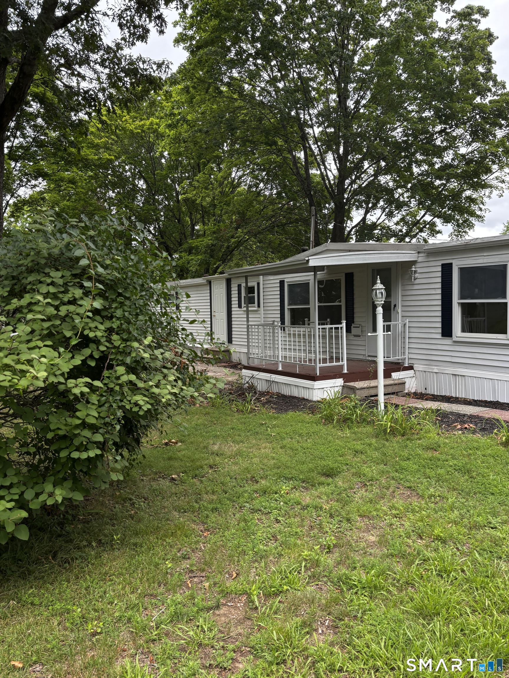 Photo 4 of Manufactured home for sale at 33 Whitewood Rd, Killingworth, CT 06419 | MLS# 24194818 | Listing updated on 2026-09-22