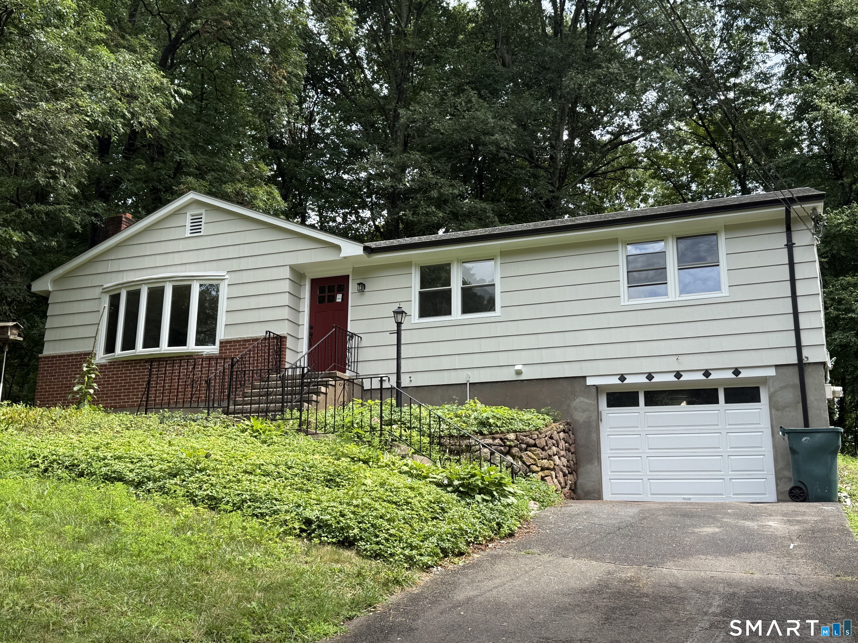 Welcome to 46 Forest Court North! Beautifully remodeled home in a highly desirable neighborhood. Move right in to this 3 bedroom, 2 and 1/2 bath ranch with over 2100 sqft of living space. The main level includes completely new kitchen w/sliders to deck, sunken living room w/fireplace, 3 bedrooms and 2 brand new full baths! The primary bath has radiant floor heating and a lip free shower. Continue to the lower level to find a family/tv room w/built-ins, laundry room and separate 1/2 bath. Two additional flex spaces for office, gym, etc. New HVAC including Central A/C. Make your appointment to view today!