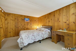 Double closets on the side wall