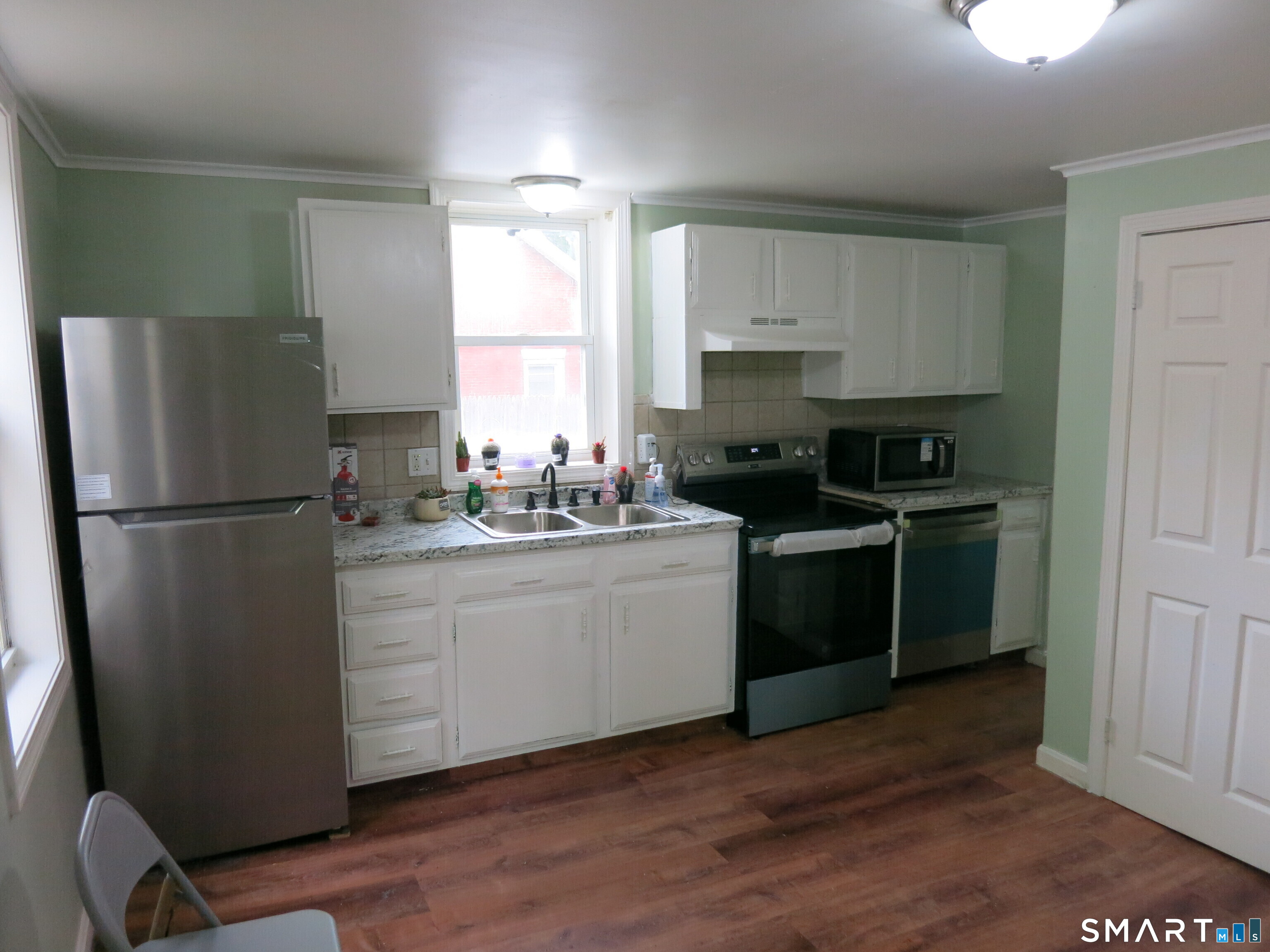 Photo 2 of Multi family home for sale at 983 Riverside Dr, North Grosvenordale, CT 06255 | MLS# 24198176 | Listing updated on 2026-08-13
