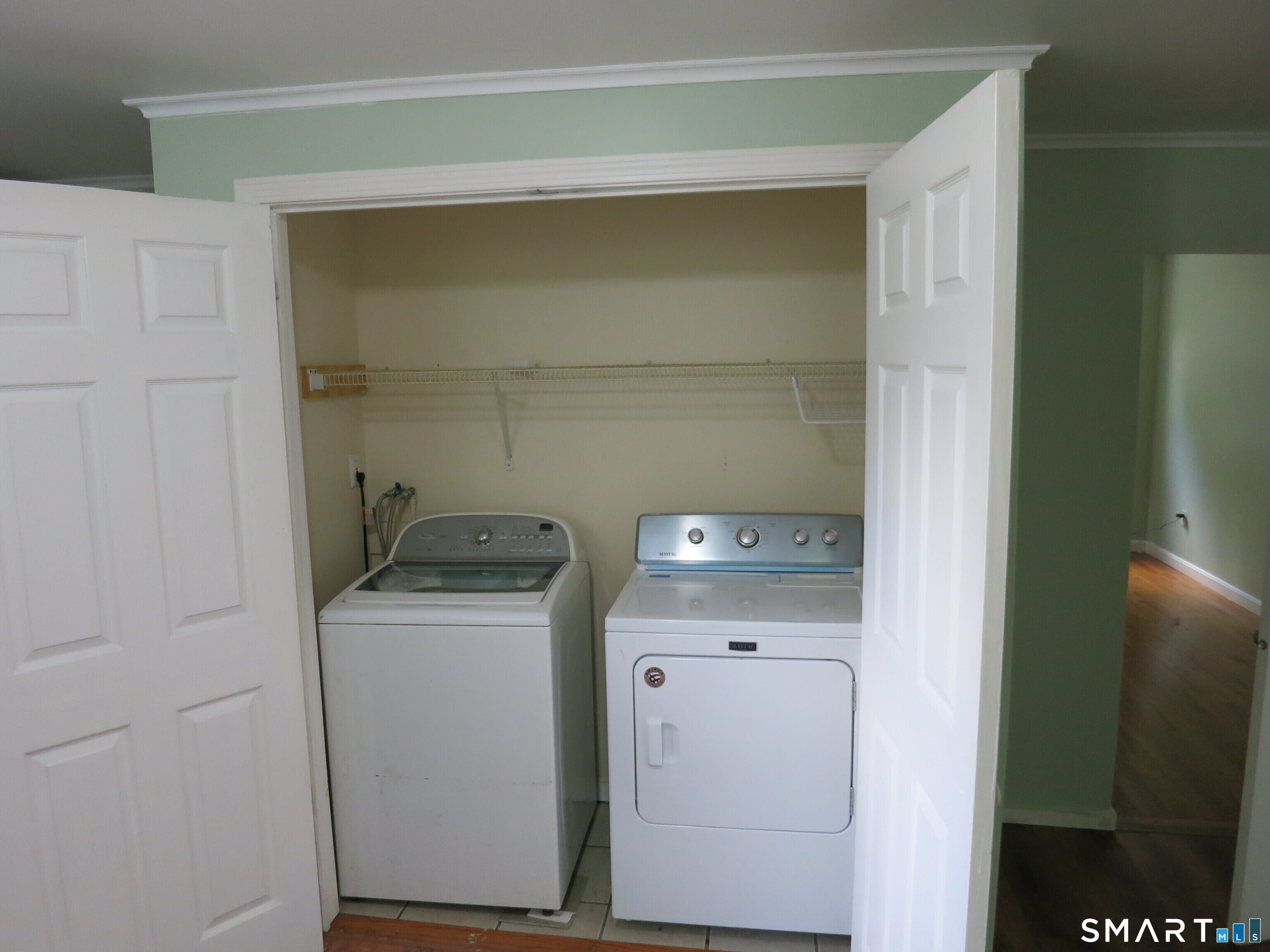 Photo 3 of Multi family home for sale at 983 Riverside Dr, North Grosvenordale, CT 06255 | MLS# 24198176 | Listing updated on 2026-08-13
