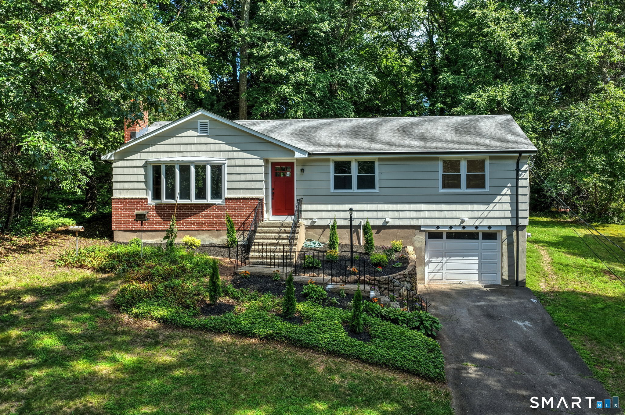 Welcome to 46 Forest Court North! Beautifully remodeled home in a highly desirable neighborhood. Move right in to this 3 bedroom, 2 and 1/2 bath ranch with over 2100 sqft of living space. The main level includes completely new kitchen w/sliders to deck, sunken living room w/fireplace, 3 bedrooms and 2 brand new full baths! The primary bath has radiant floor heating and a lip free shower. Continue to the lower level to find a family/tv room w/built-ins, laundry room and separate 1/2 bath. Two additional flex spaces for office, gym, etc. New HVAC including Central A/C. Make your appointment to view today!