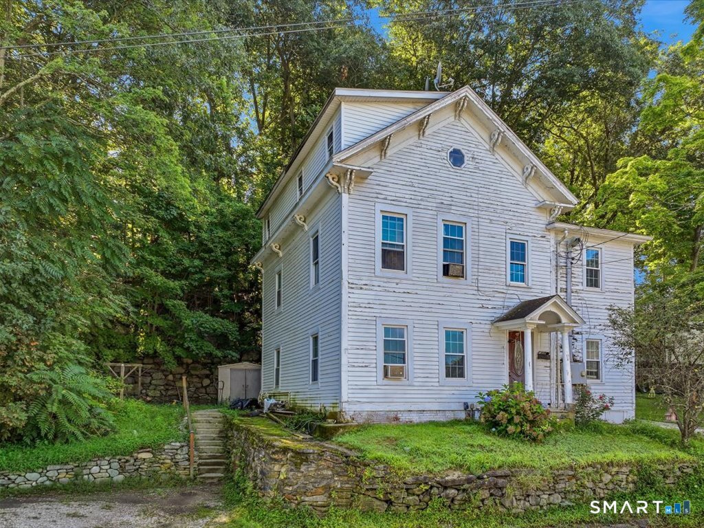 Photo 2 of Multi family home for sale at 57 Wilkinson St, Putnam, CT 06260 | MLS# 24193499 | Listing updated on 2026-08-31